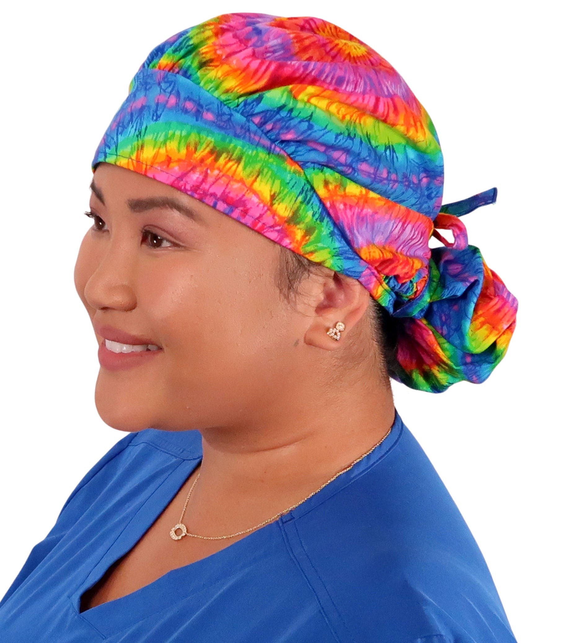 Front Facing Tied View of a Woman Wearing a Tied Back Banded Bouffant Ponytail Surgical Scrub Cap - Tie Dye Patterned Fabric