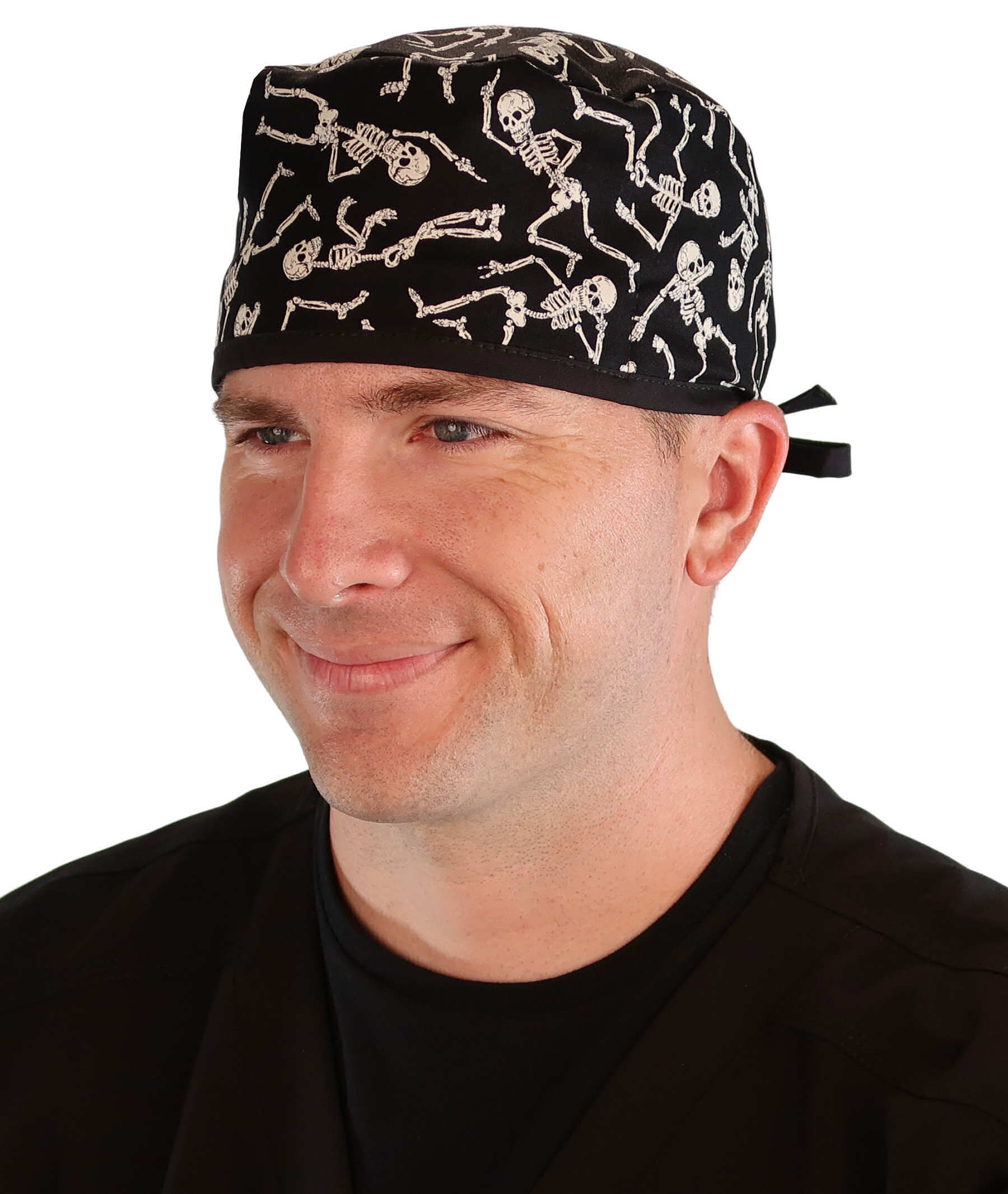 Front Facing View of a Man Wearing a Classic Cotton Surgical Scrub Cap - Dancing Skeletons with Black Ties (Glow In The Dark) Pattern.
