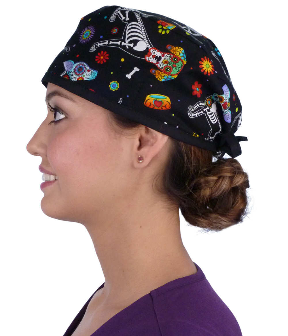 Side facing image of a woman in scrubs wearing a Classic Surgical Scrub Cap in a X Ray Dogs with black ties pattern.