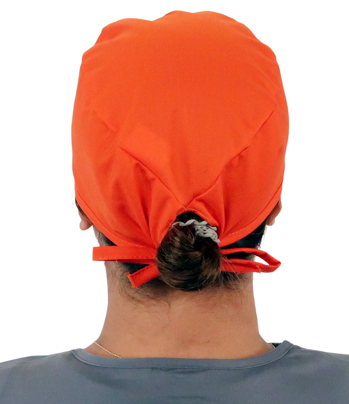 Back Facing View of a Woman Wearing a Classic Cotton Surgical Scrub Cap - Blaze Orange Fabric.