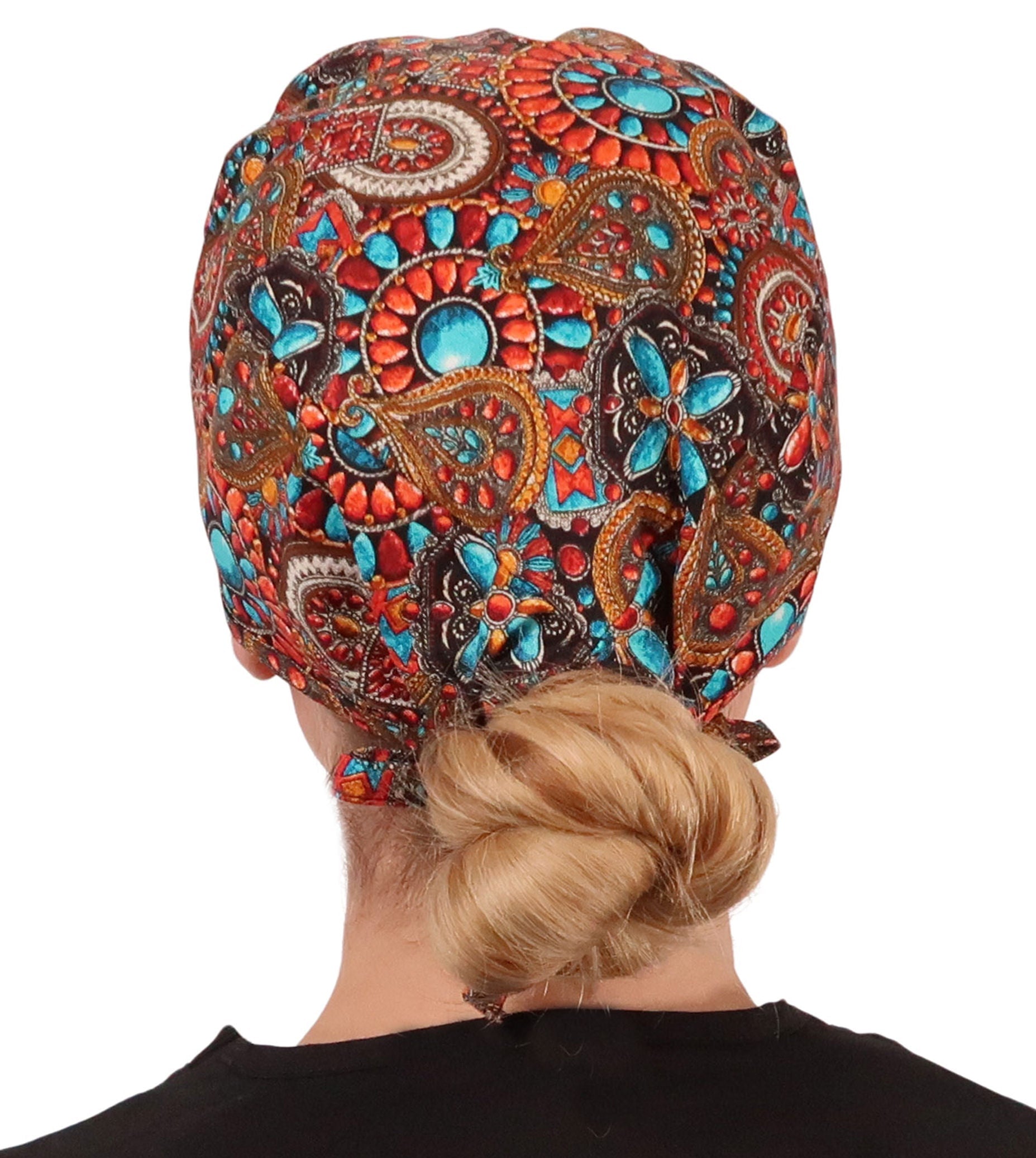 Back facing image of a woman in scrubs wearing a Classic Surgical Scrub Cap in Indian Jewelry Coral pattern.