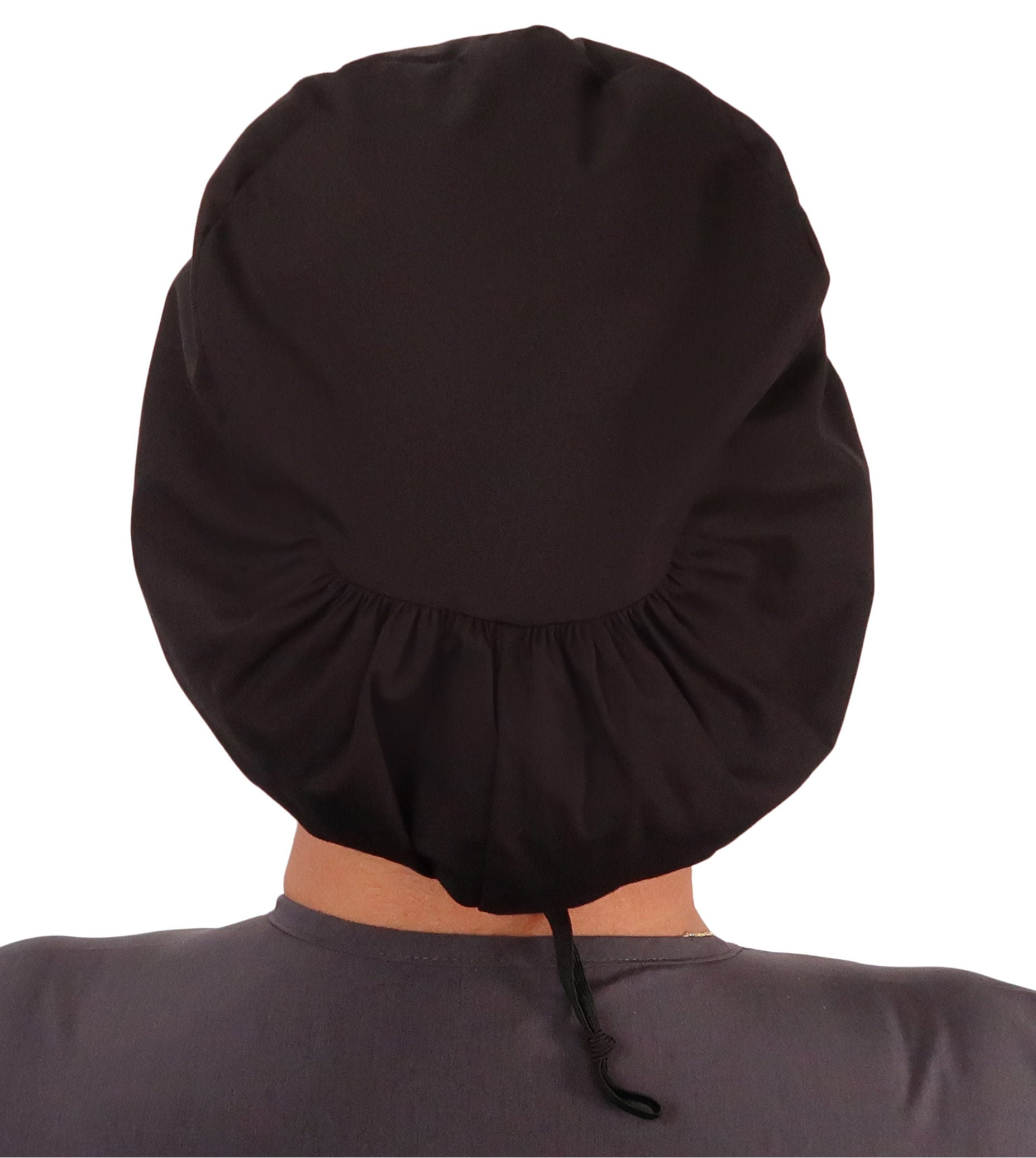 Back facing image of a woman in scrubs wearing a Black Euro Style Riley Comfort Scrub Cap.