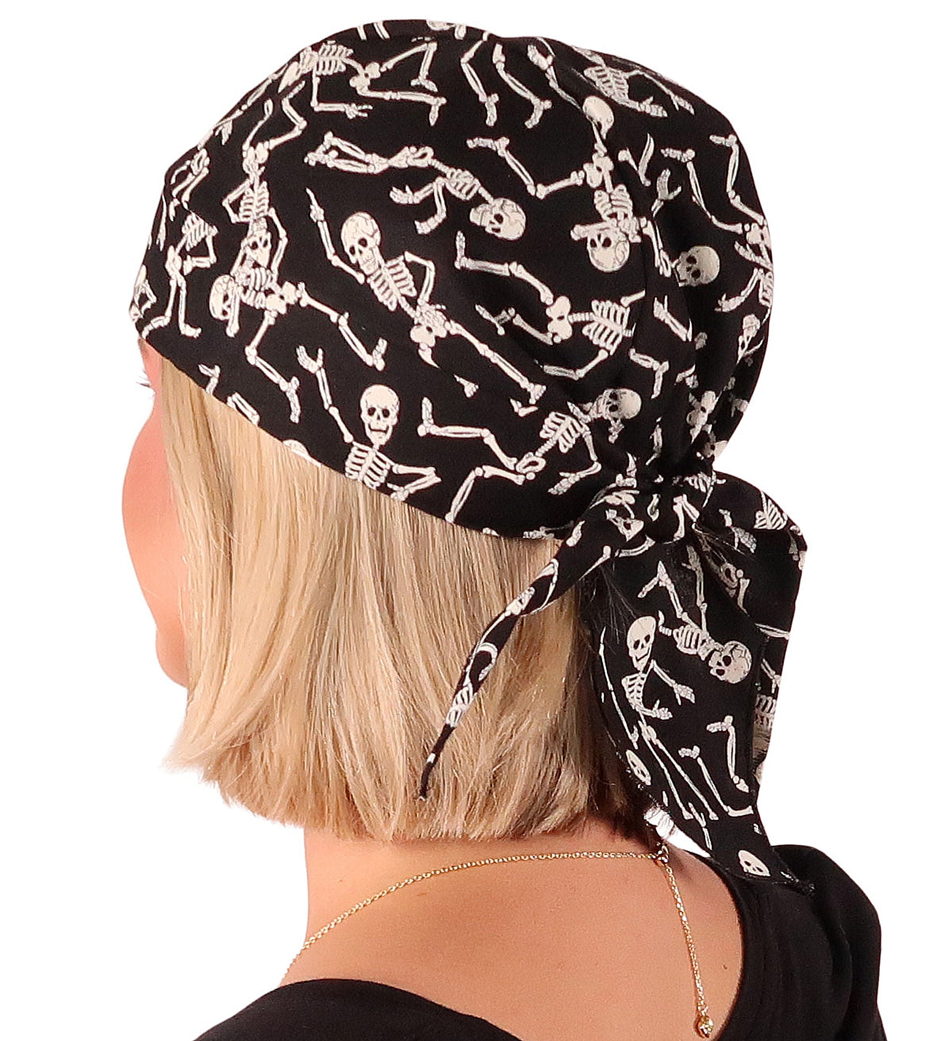 Side Facing View of a man wearing a classic Skull Cap in Dancing Skeletons (Glow In The Dark) pattern    