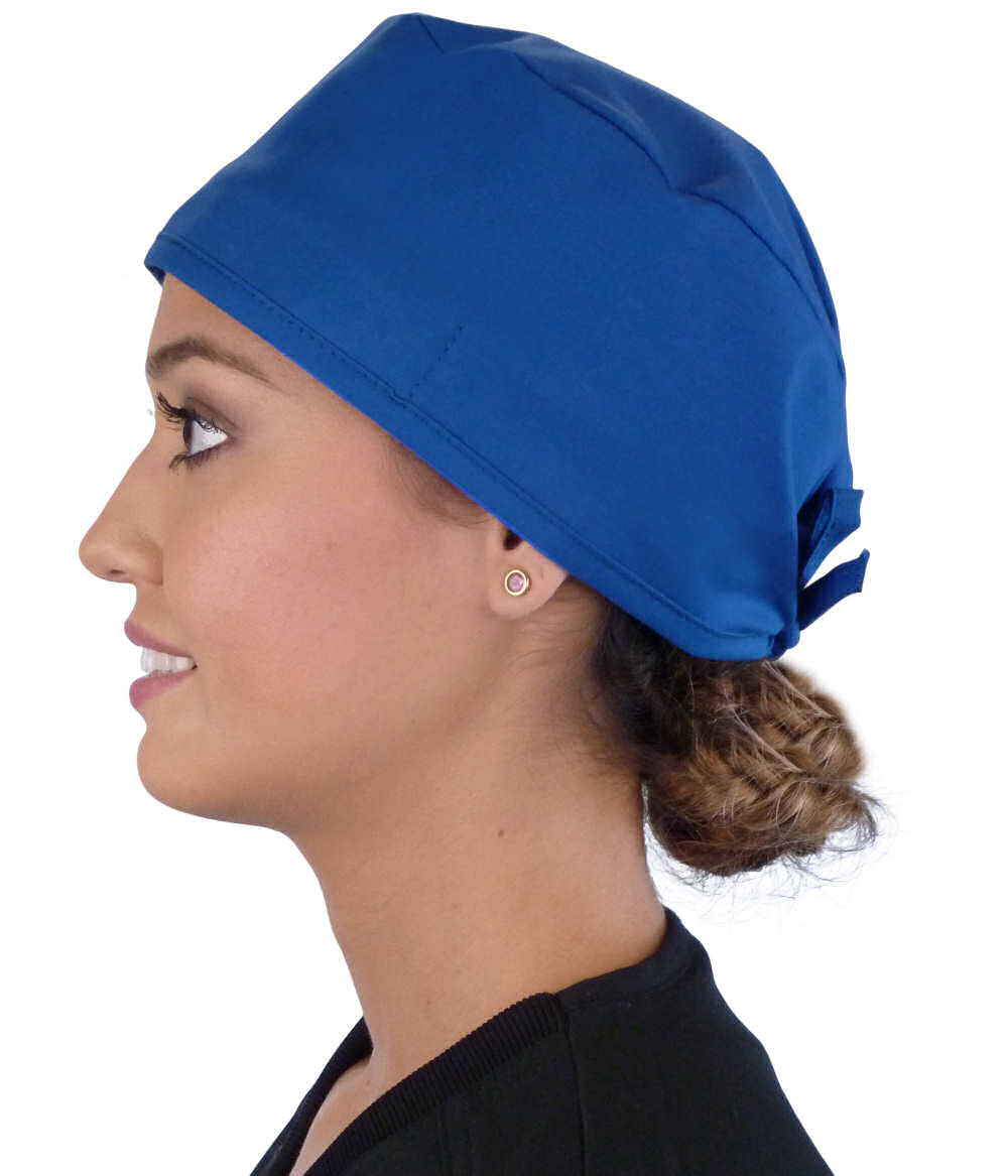 Side Facing View of a Woman Wearing a Classic Cotton Surgical Scrub Cap - Royal Fabric with Three Monkeys Patch.