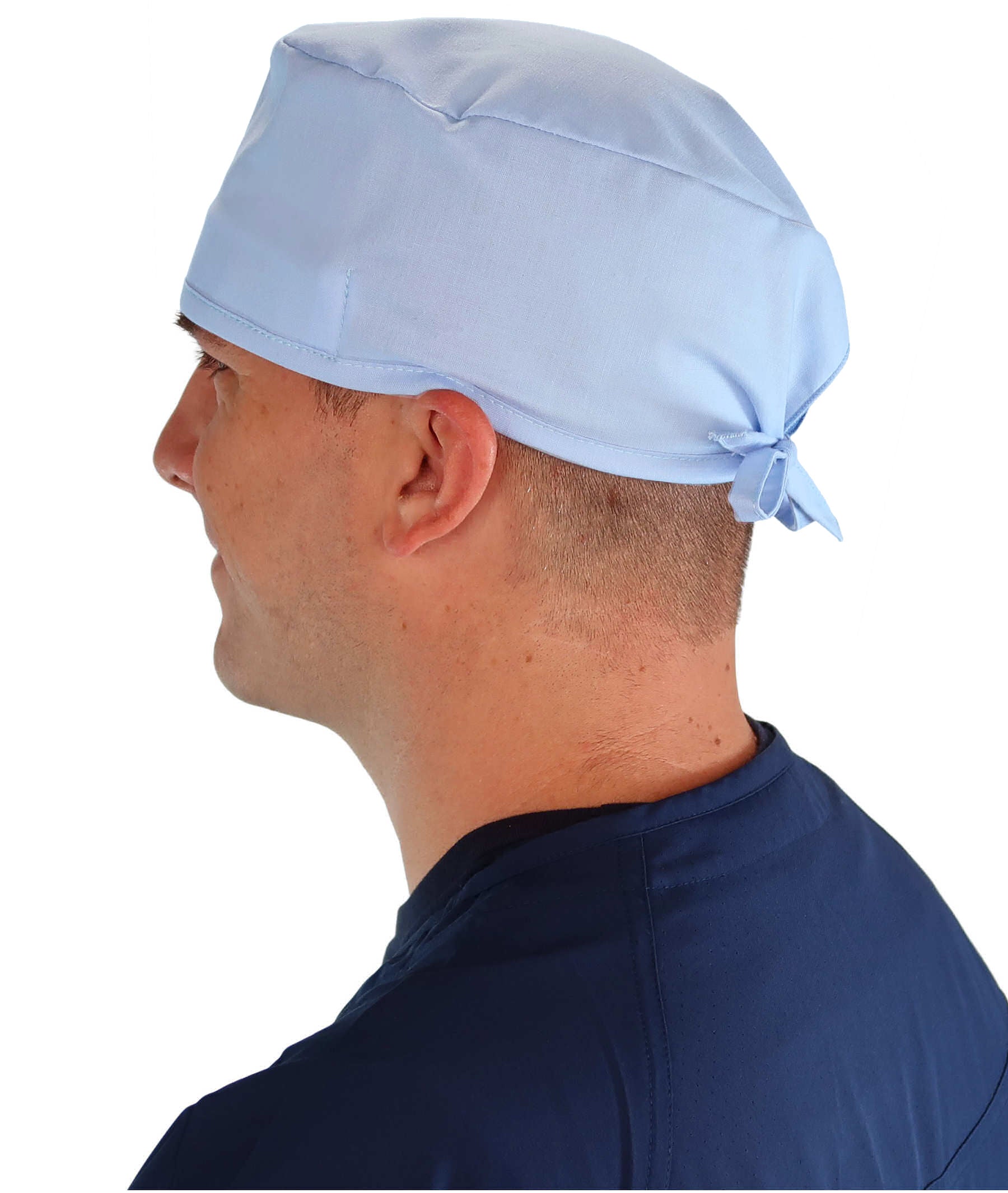 Side Facing View of a Man Wearing a Classic Cotton Surgical Scrub Cap - Solid Sky Light Scrub Cap