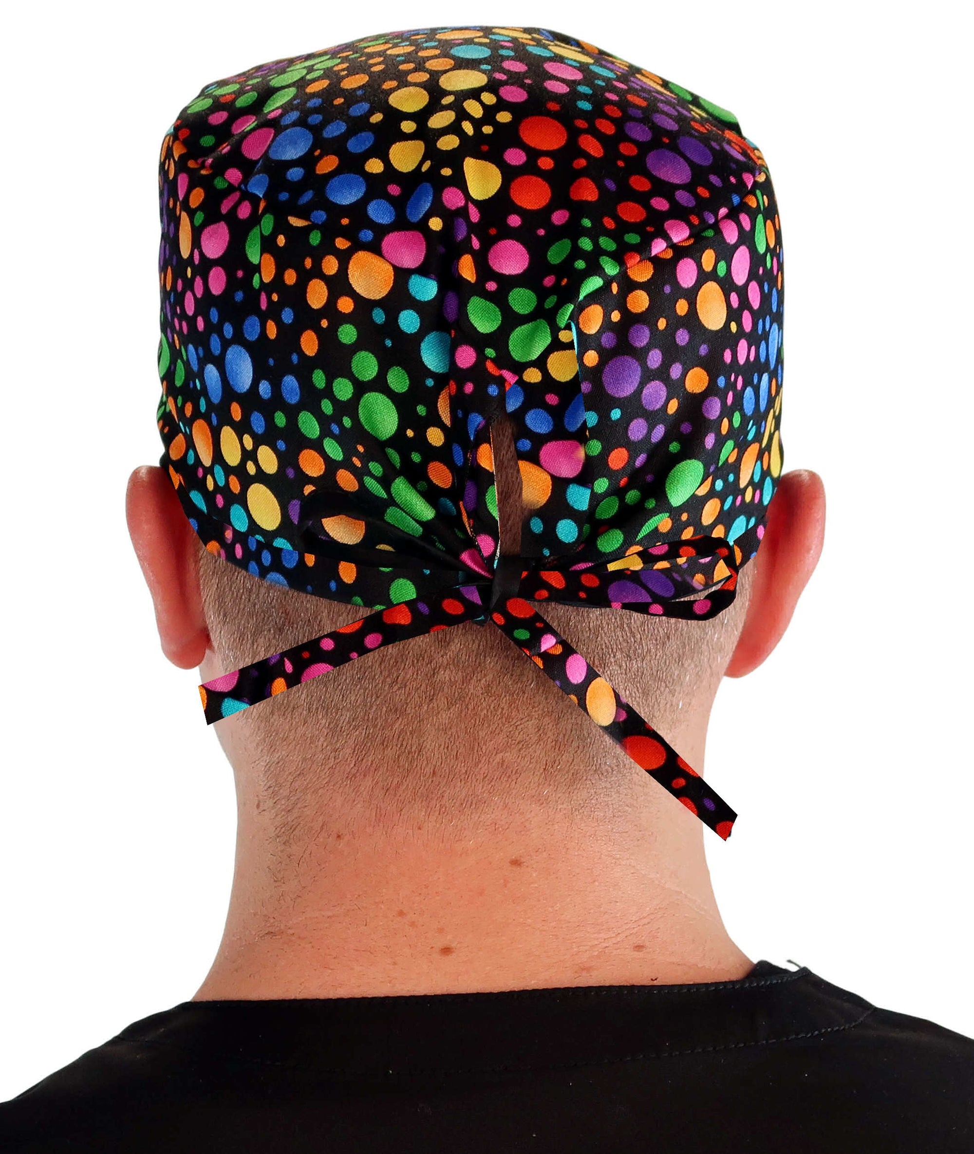 Back facing image of a man in scrubs wearing a Classic Surgical Scrub Cap in a Multi Dots pattern.