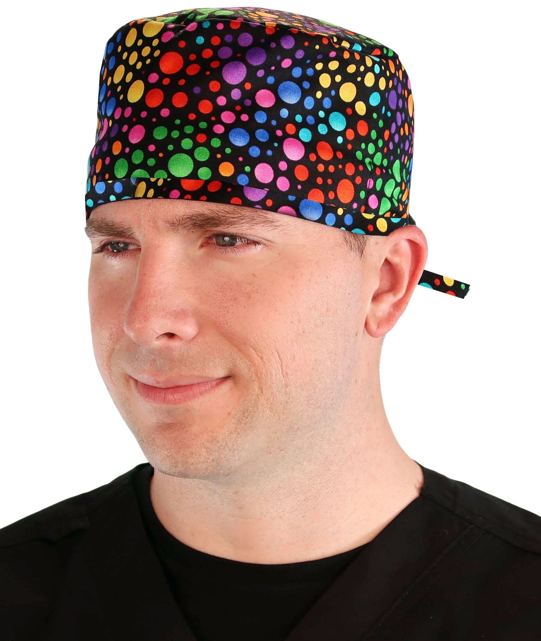 Front facing image of a man in scrubs wearing a Classic Surgical Scrub Cap in a Multi Dots pattern.