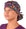 Front Facing Tied View of a Woman Wearing a Tied Back Banded Bouffant Ponytail Surgical Scrub Cap - Bright Flower Paisley Patterned Fabric  