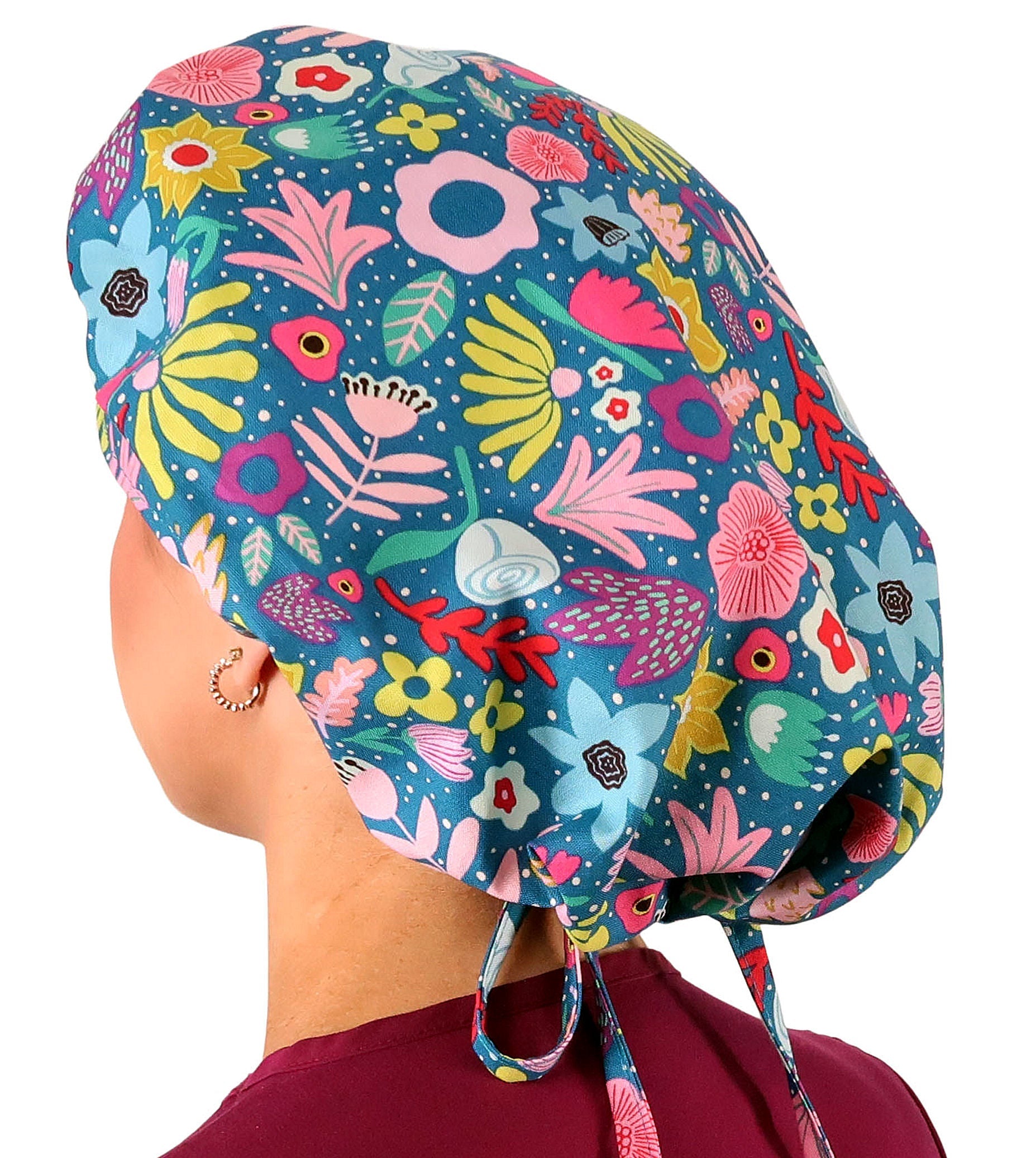 Left Rear Facing View of a Woman Wearing a Bouffant Ponytail Scrub Cap  Not Tied - Floating Flowers Banded Bouffant Ponytail Surgical Scrub Caps Pattern
