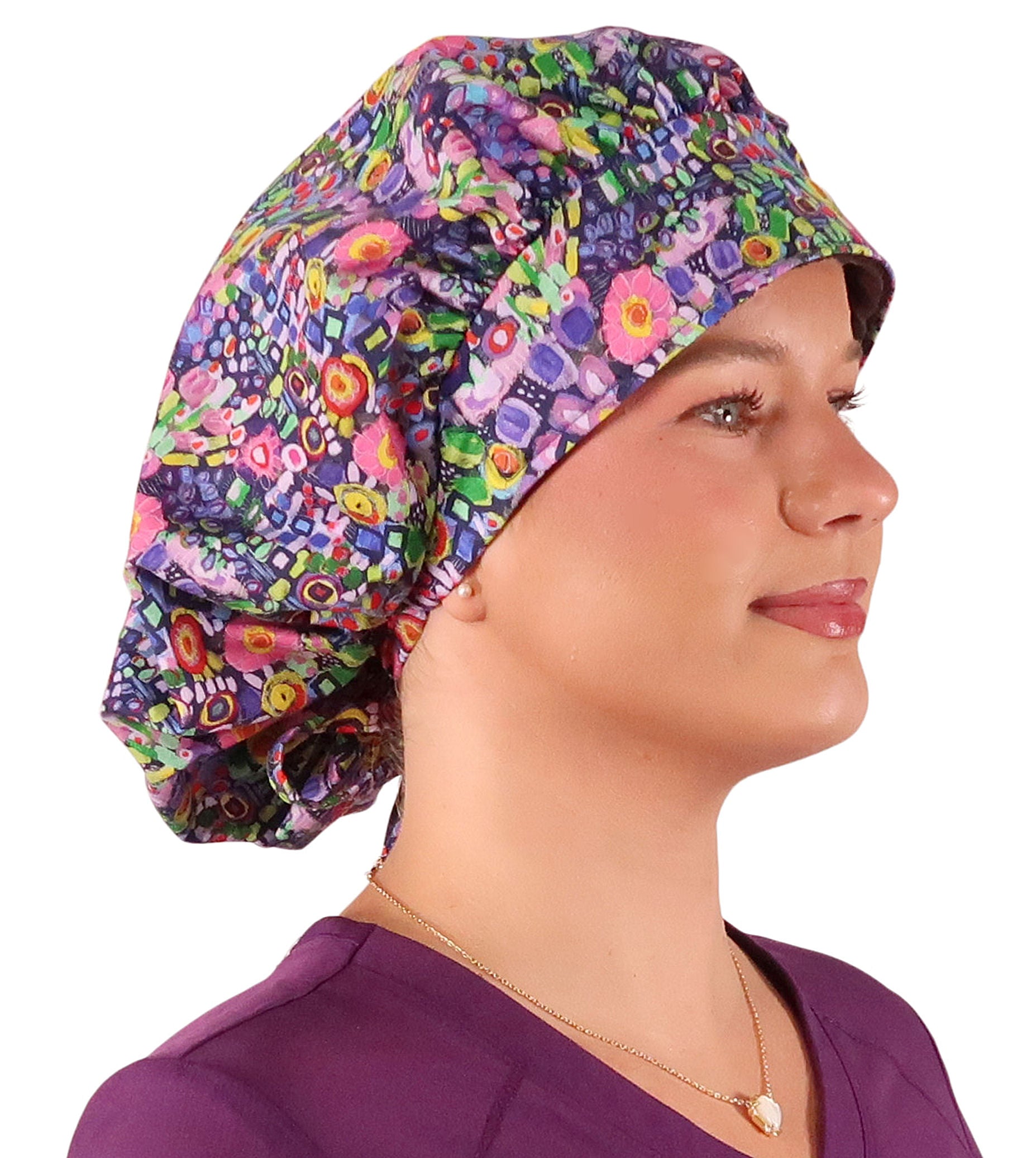 Side Facing Untied View of a Woman Wearing a Bouffant Ponytail Scrub Cap - Painted Petals Banded Bouffant Ponytail Surgical Scrub Caps Pattern