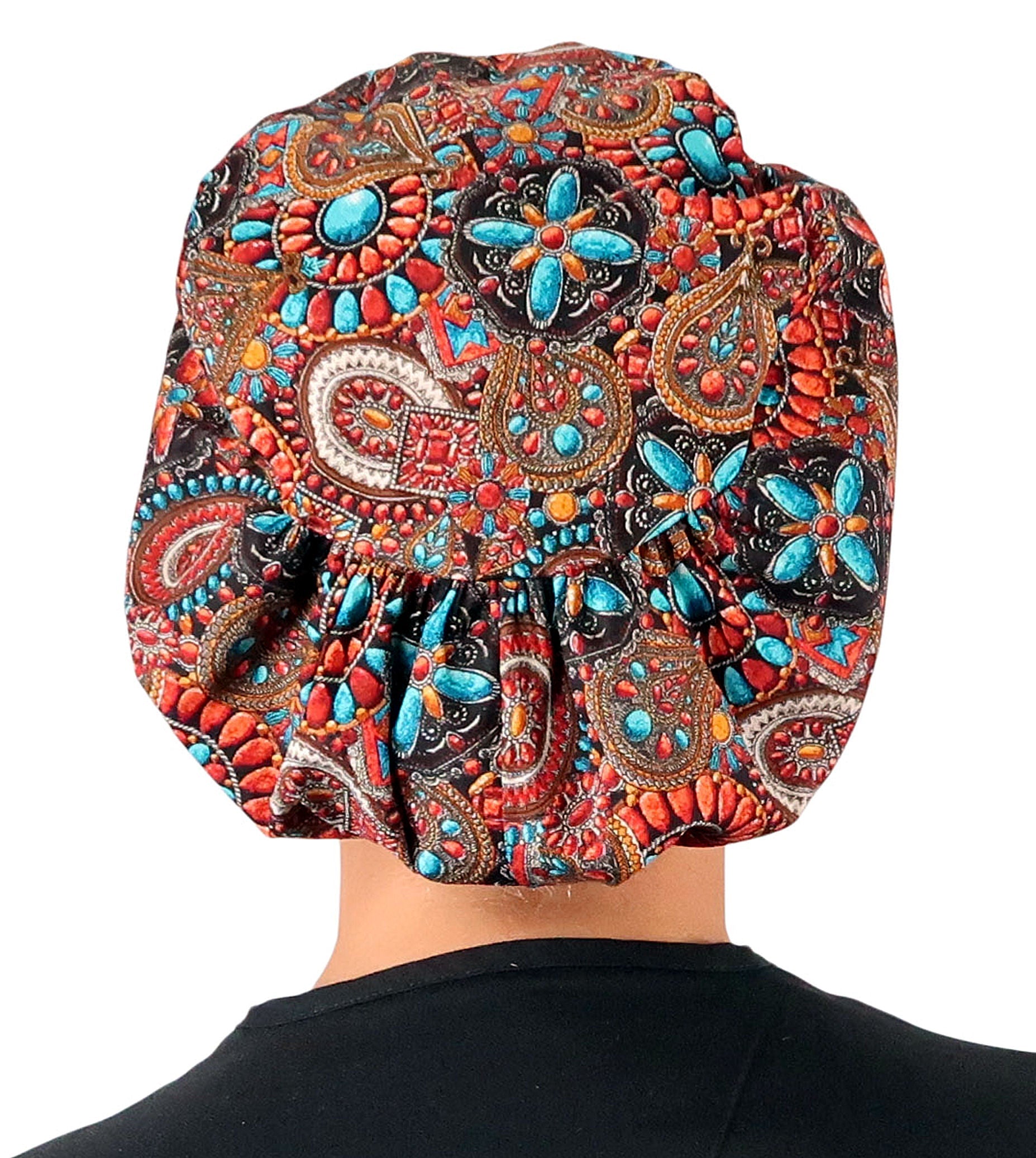 Back facing image of a woman in scrubs wearing a Indian Jewelry Coral Euro Style Riley Comfort Scrub Cap.