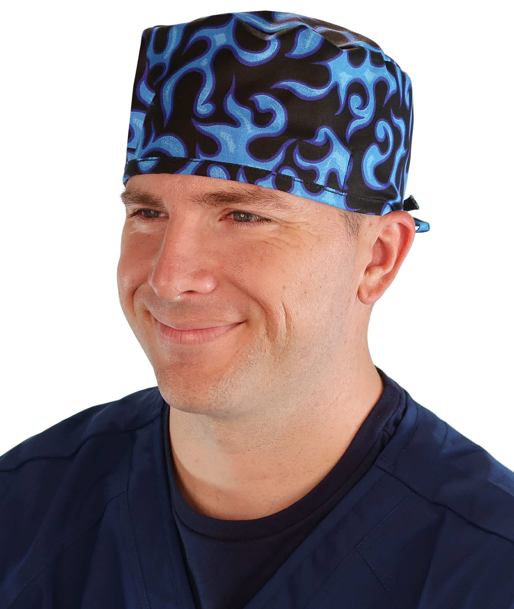 Front facing image of a man in scrubs wearing a Classic Surgical Scrub Cap in Liquid Blue Flames pattern.