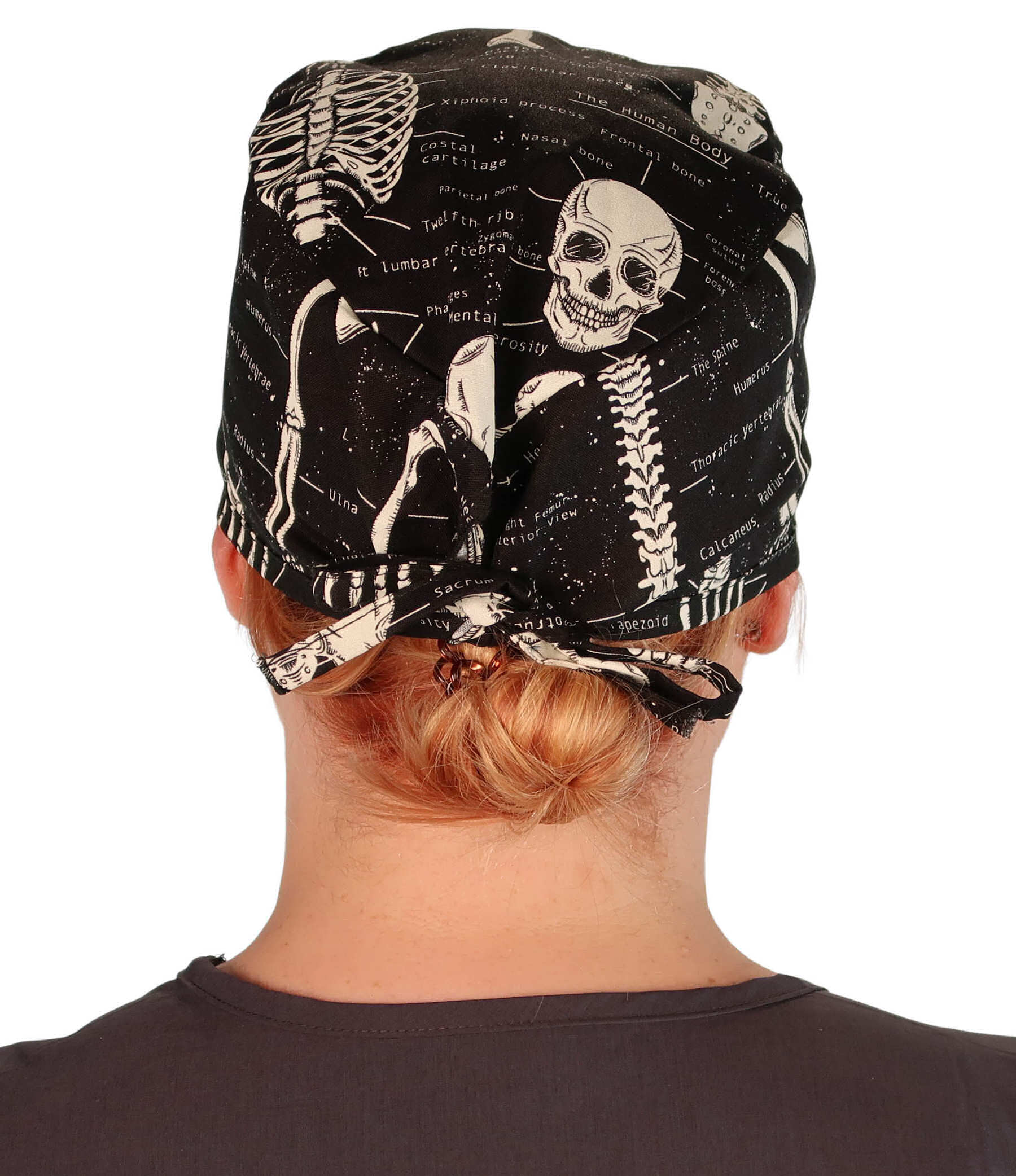 Back Facing View of a woman Wearing a Classic Cotton Surgical Scrub Cap - Human Body Skeleton (Glow In The Dark) Pattern.