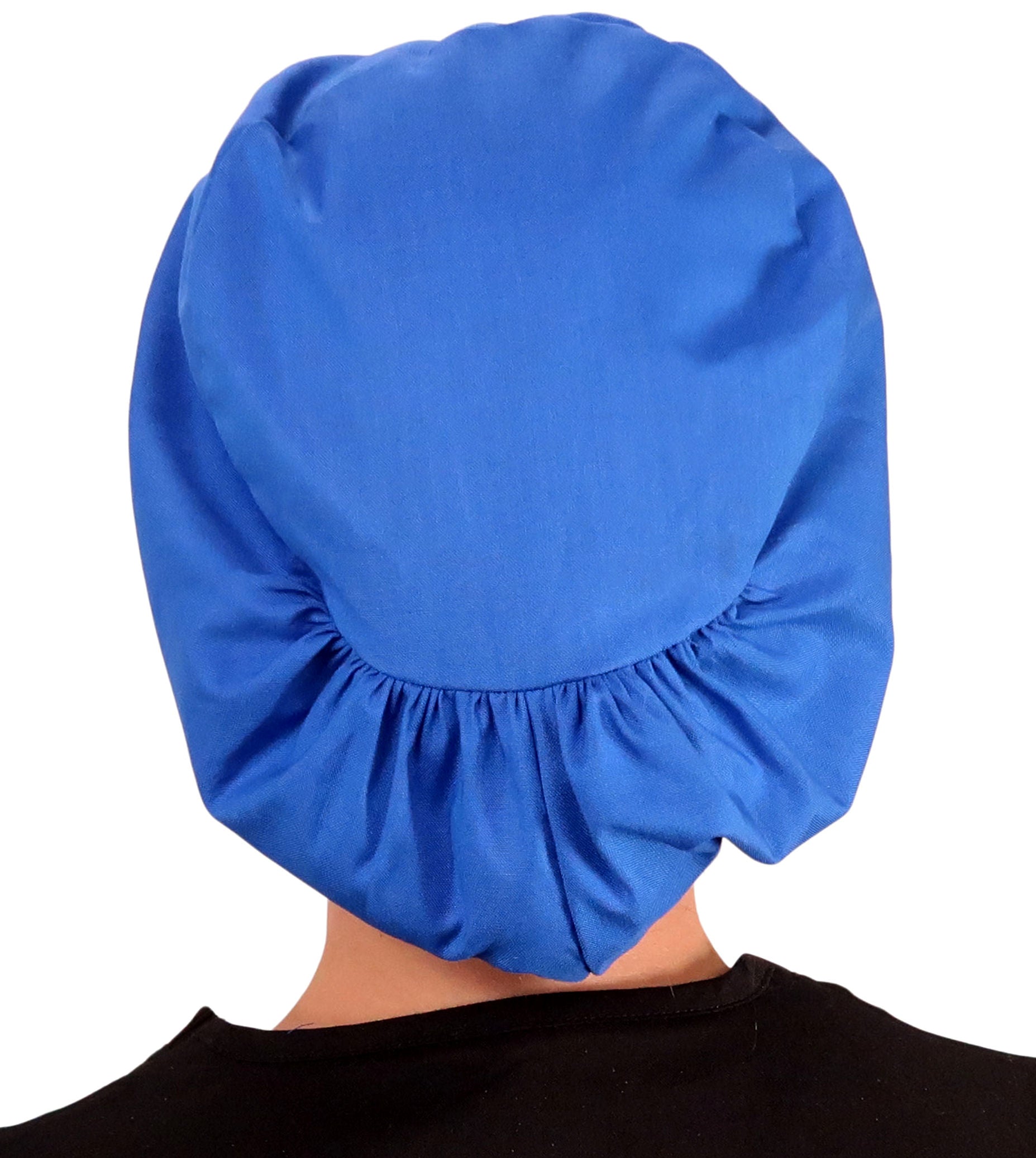 Back facing image of a woman in scrubs wearing a Blue Butterfly Patch on Royal Euro Style Riley Comfort Scrub Cap.