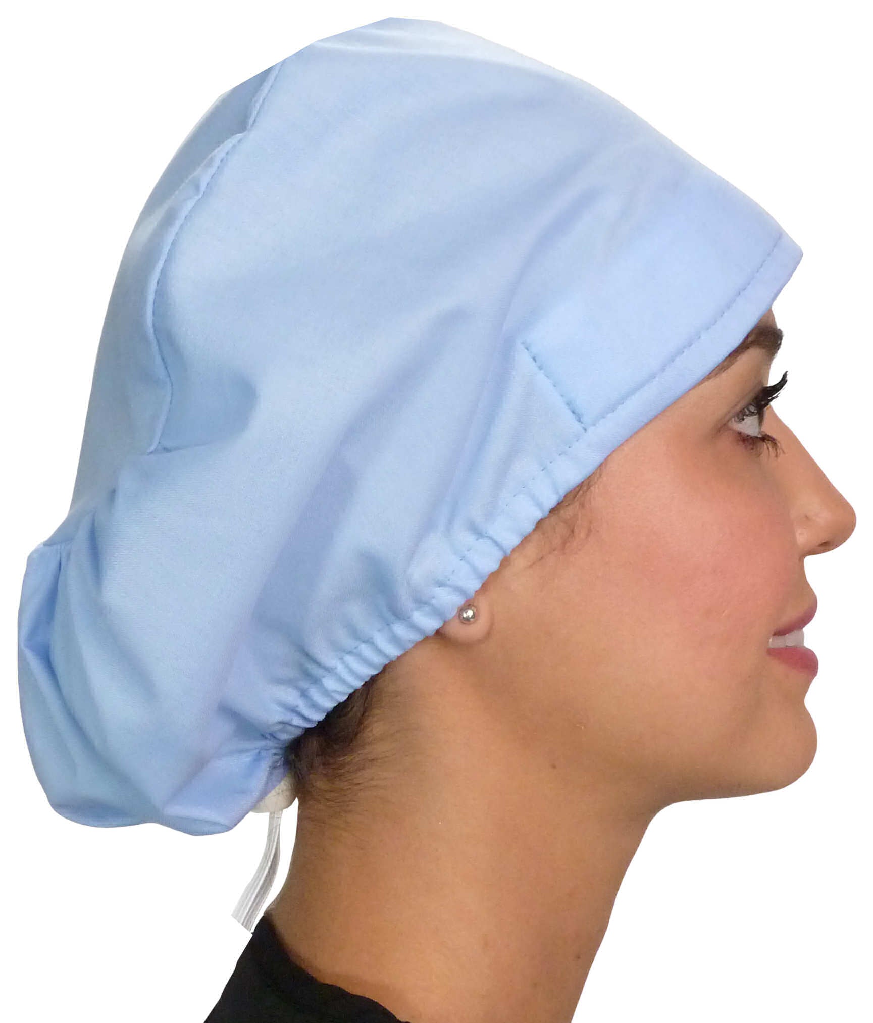 Side facing image of a woman in scrubs wearing a Light Sky Blue Euro Style Riley Comfort Scrub Cap.