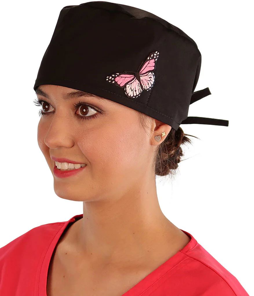 Side Facing View of a Woman Wearing a Classic Cotton Surgical Scrub Cap - Black Fabric with Pink Butterfly Patch.
