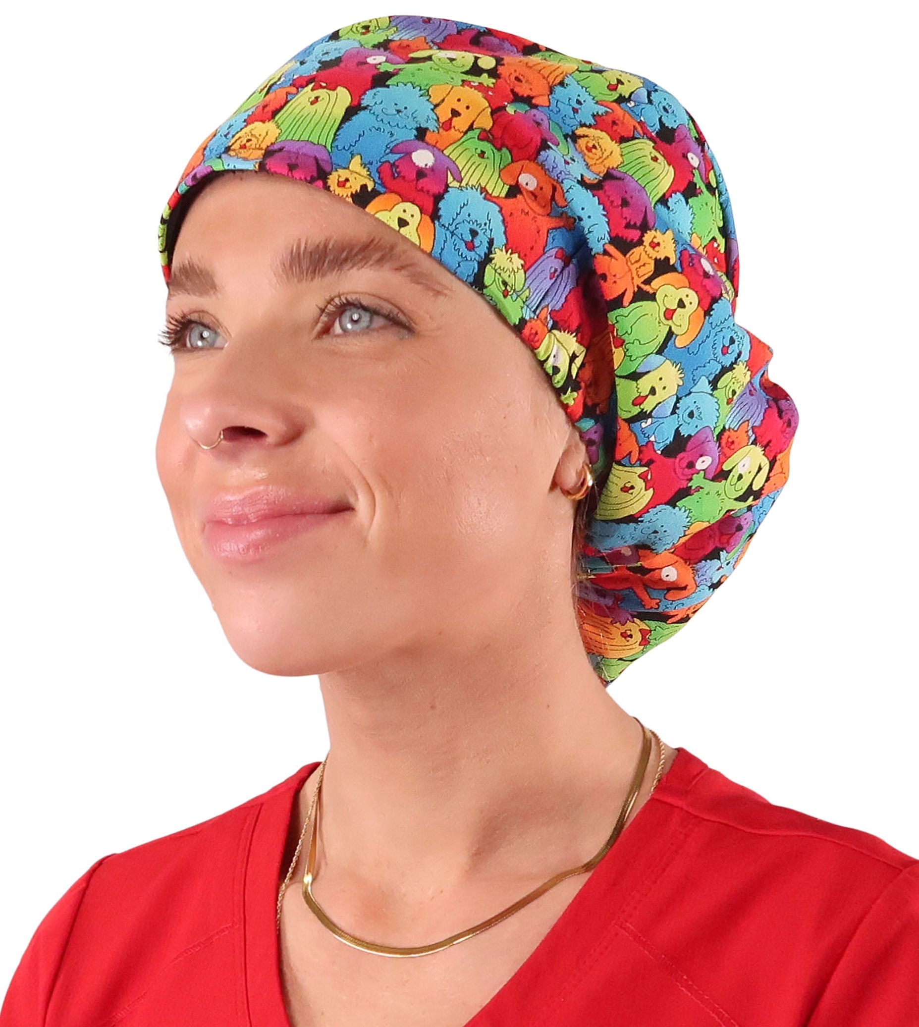 Front facing image of a woman in scrubs wearing a Prismatic Pooch Party Euro Style Riley Comfort Scrub Cap.