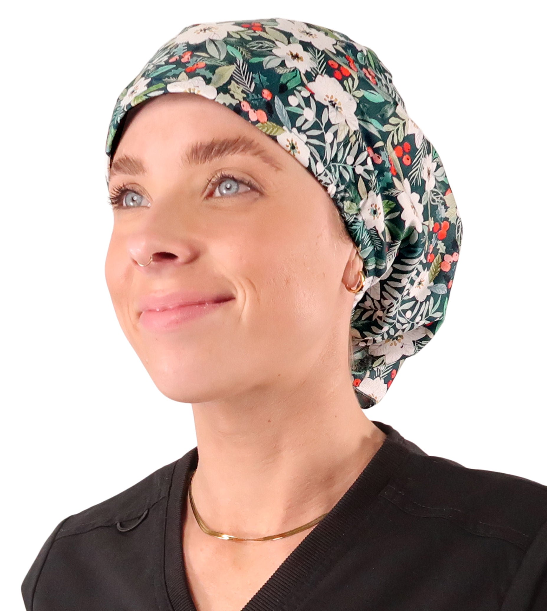 Front facing image of a woman in scrubs wearing a Winter Wonderland (Chirstmas Holiday) Euro Style Riley Comfort Scrub Cap.