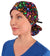 Front Facing Tied View of a Woman Wearing a Tied Back Banded Bouffant Ponytail Surgical Scrub Cap - Multi Color Dots Patterned Fabric with Black Ties 