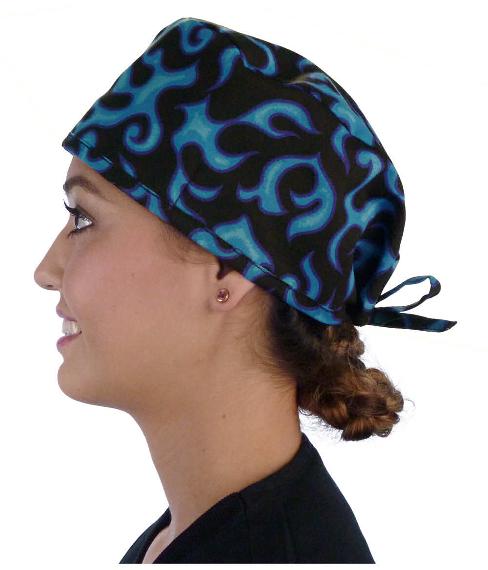 Side facing image of a woman in scrubs wearing a Classic Surgical Scrub Cap in Liquid Blue Flames pattern.