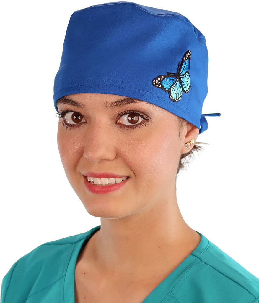 Front Facing View of a Woman Wearing a Classic Cotton Surgical Scrub Cap - Royal Fabric with Blue Butterfly Patch.