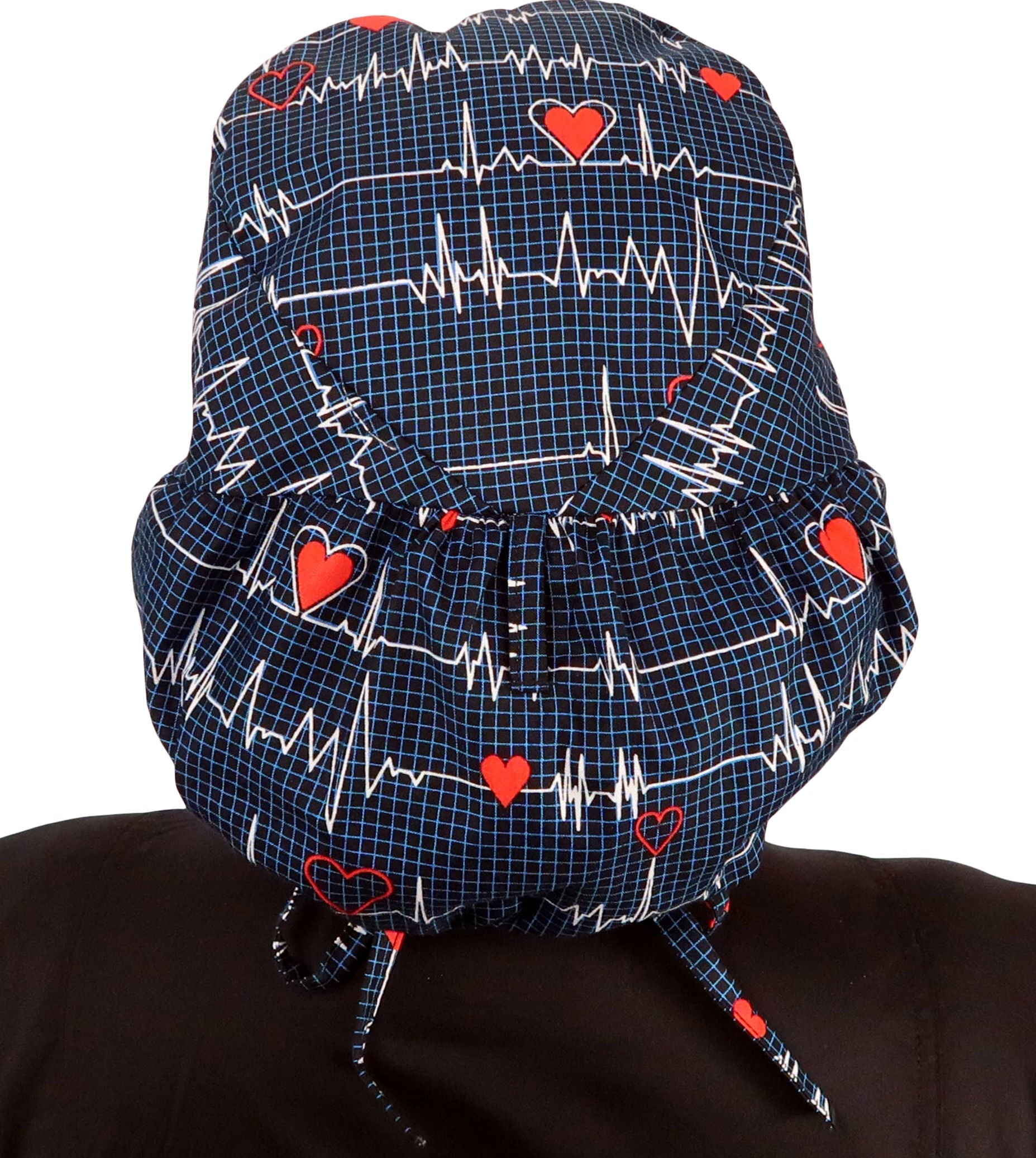 Back facing image untied of a woman in scrubs wearing a Big Hair Ponytail Scrub Cap with a Heartbeats on Navy pattern.