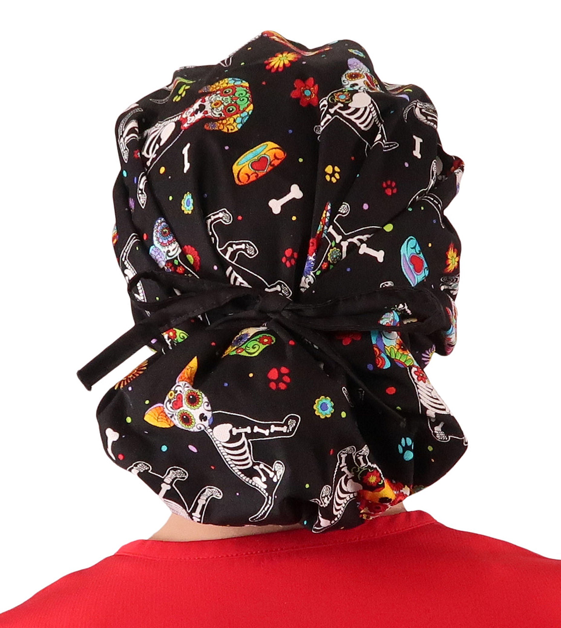 Back Facing Tied View of a Woman Wearing a Tied Back Banded Bouffant Ponytail Surgical Scrub Cap - X - Ray Dogs Patterned Fabric with Black Ties 
