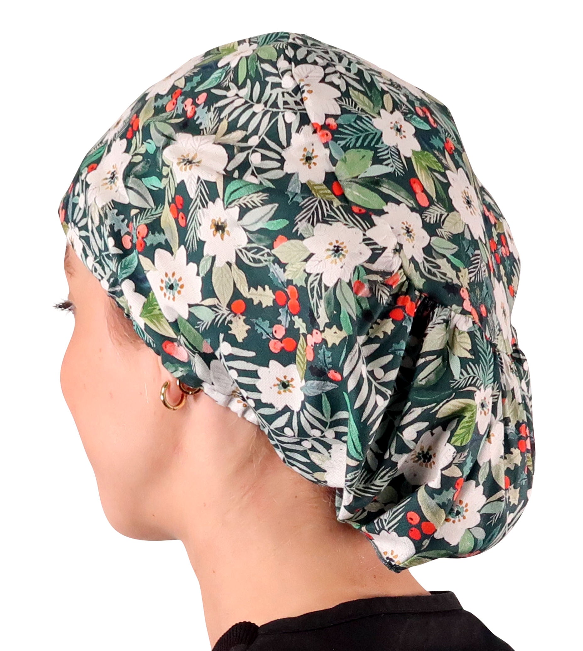 Side facing image of a woman in scrubs wearing a Winter Wonderland (Chirstmas Holiday) Euro Style Riley Comfort Scrub Cap.