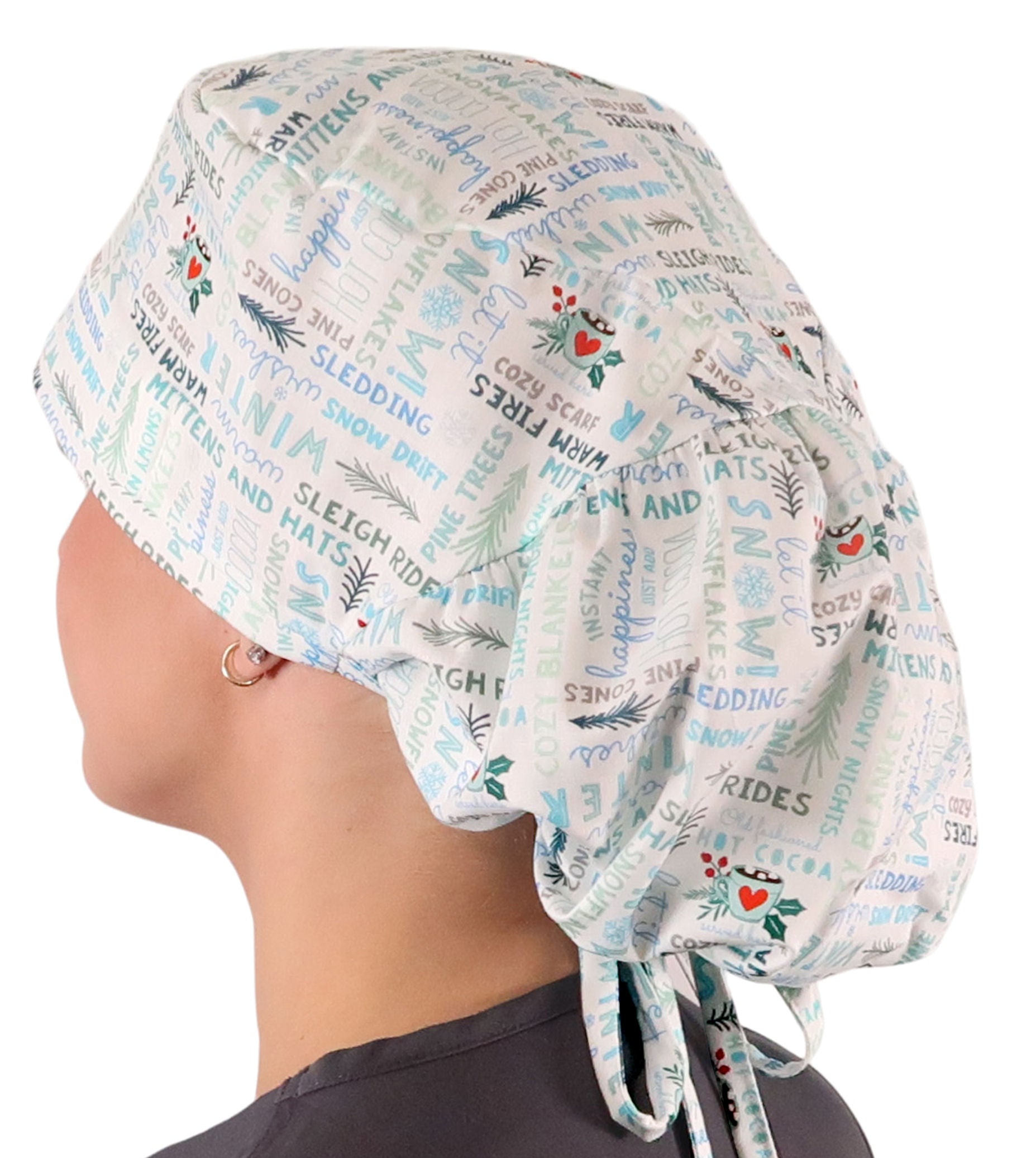 Side facing untied image of a woman in scrubs wearing a Big Hair Ponytail Scrub Cap with a Wonderful Winter Words pattern.