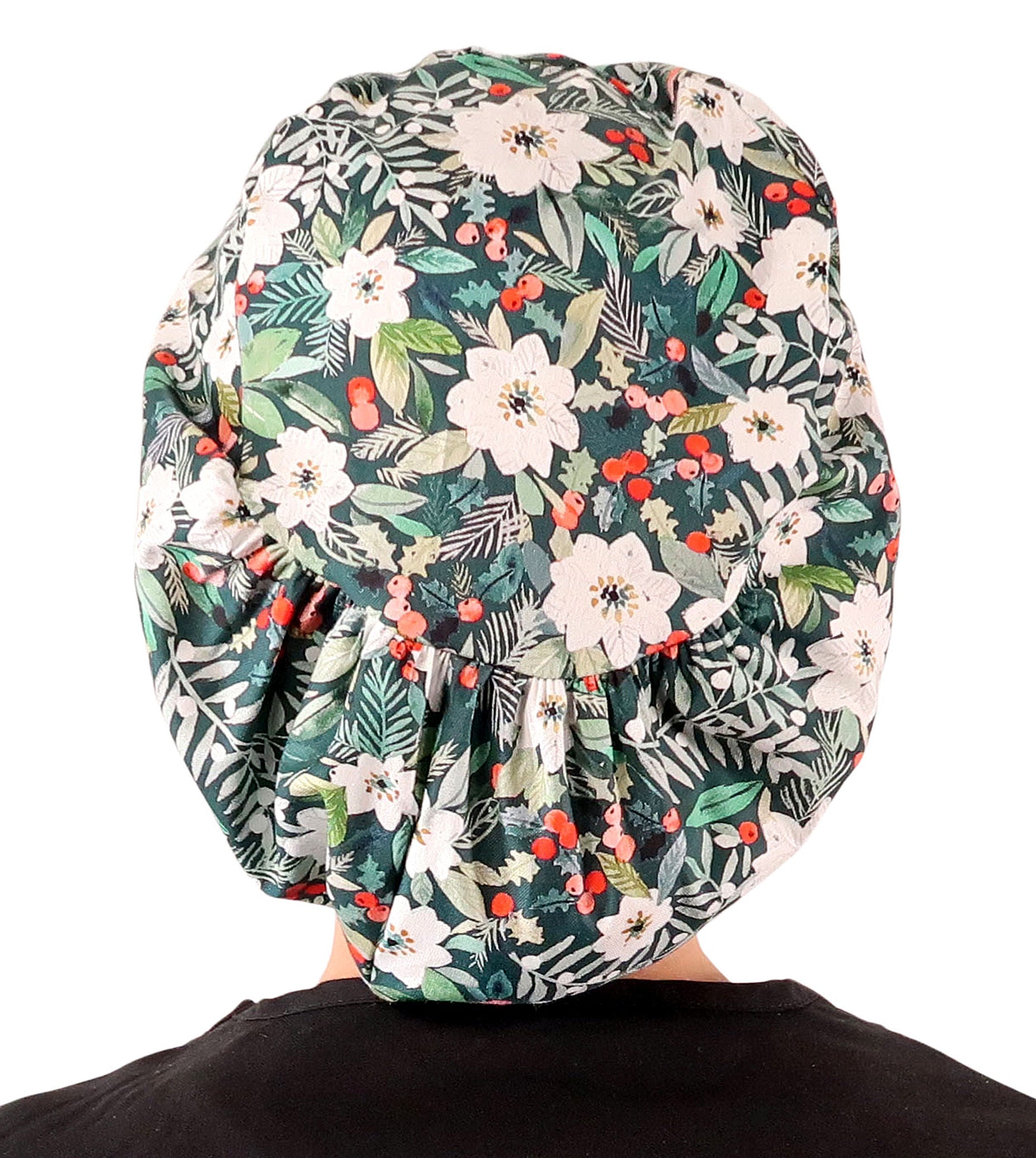 Back facing image of a woman in scrubs wearing a Winter Wonderland (Chirstmas Holiday) Euro Style Riley Comfort Scrub Cap.