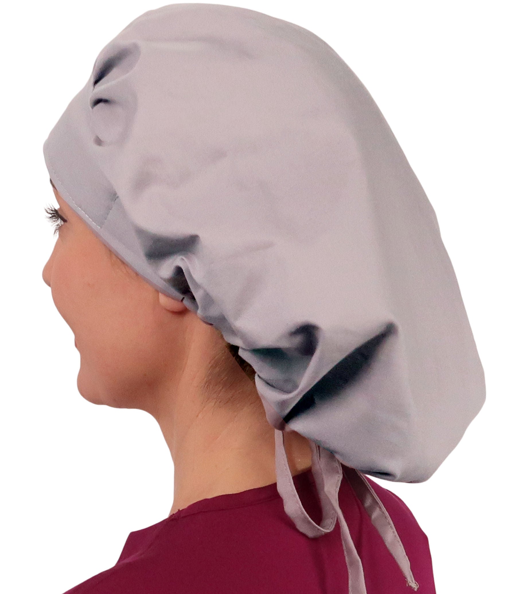 Side Facing Untied View of a Woman Wearing a Tied Back Banded Bouffant Ponytail Surgical Scrub Cap - Solid Light Grey Fabric