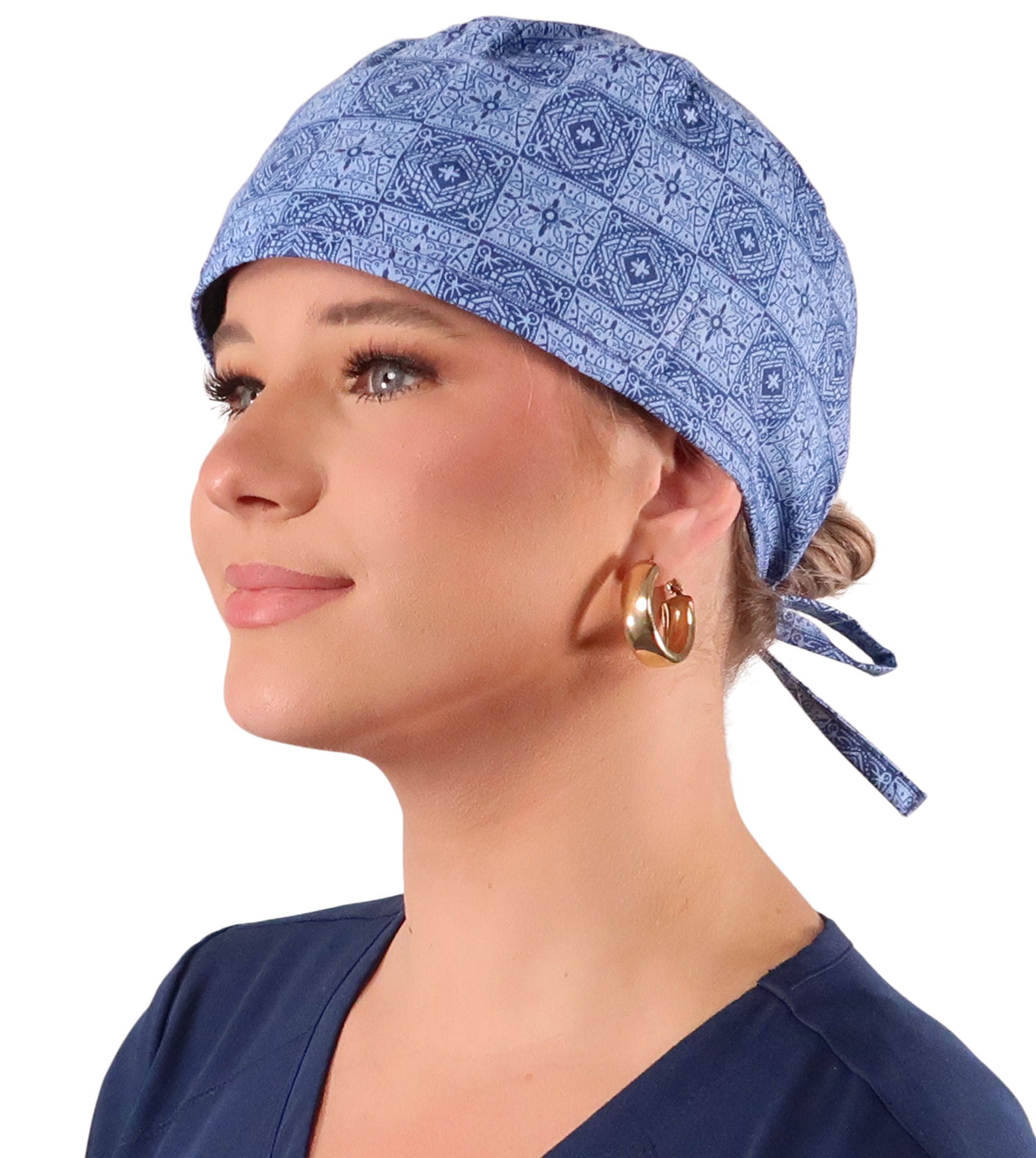 Front Facing View of a Woman Wearing a Classic Cotton Surgical Scrub Cap - Tuscan Blue Tiles Pattern.