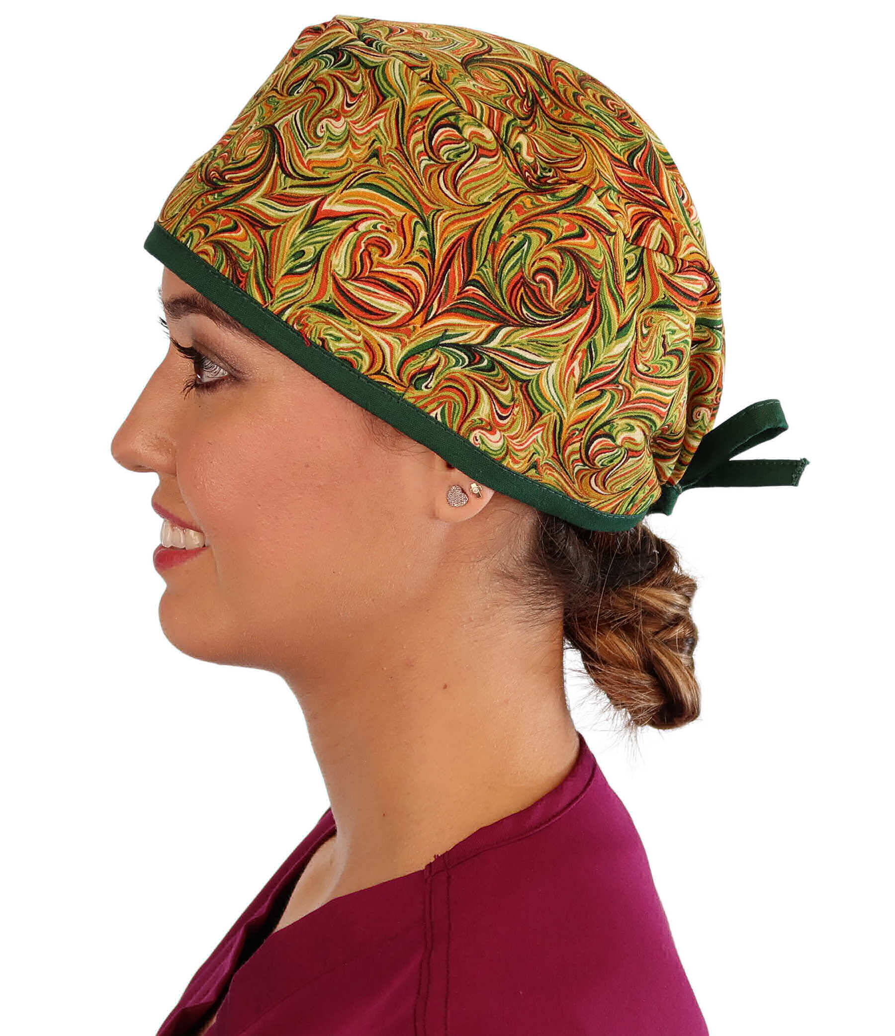 Side Facing View of a Woman Wearing a Classic Cotton Surgical Scrub Cap - Fall Autumn Harvest Swirls with Green Ties Pattern.