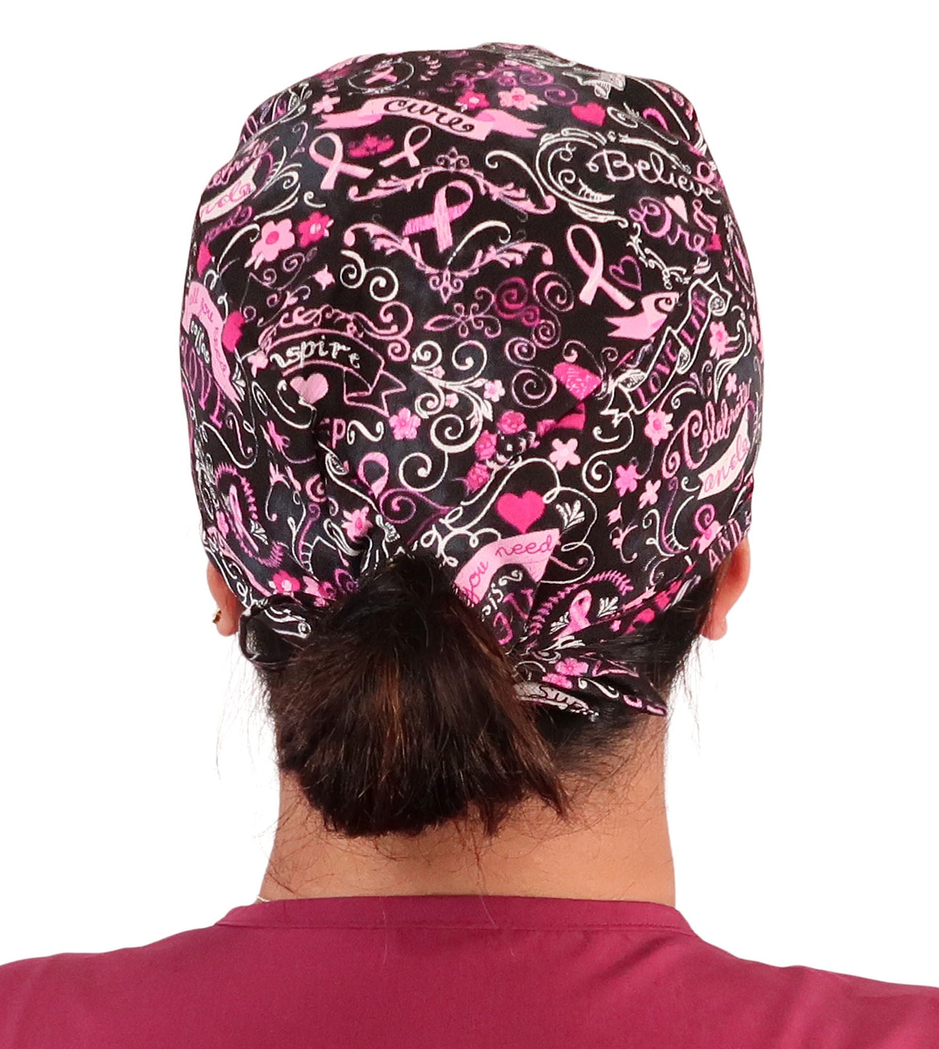 Back facing image of a woman in scrubs wearing a Classic Surgical Scrub Cap in a Pink Ribbon Collage on Black pattern.