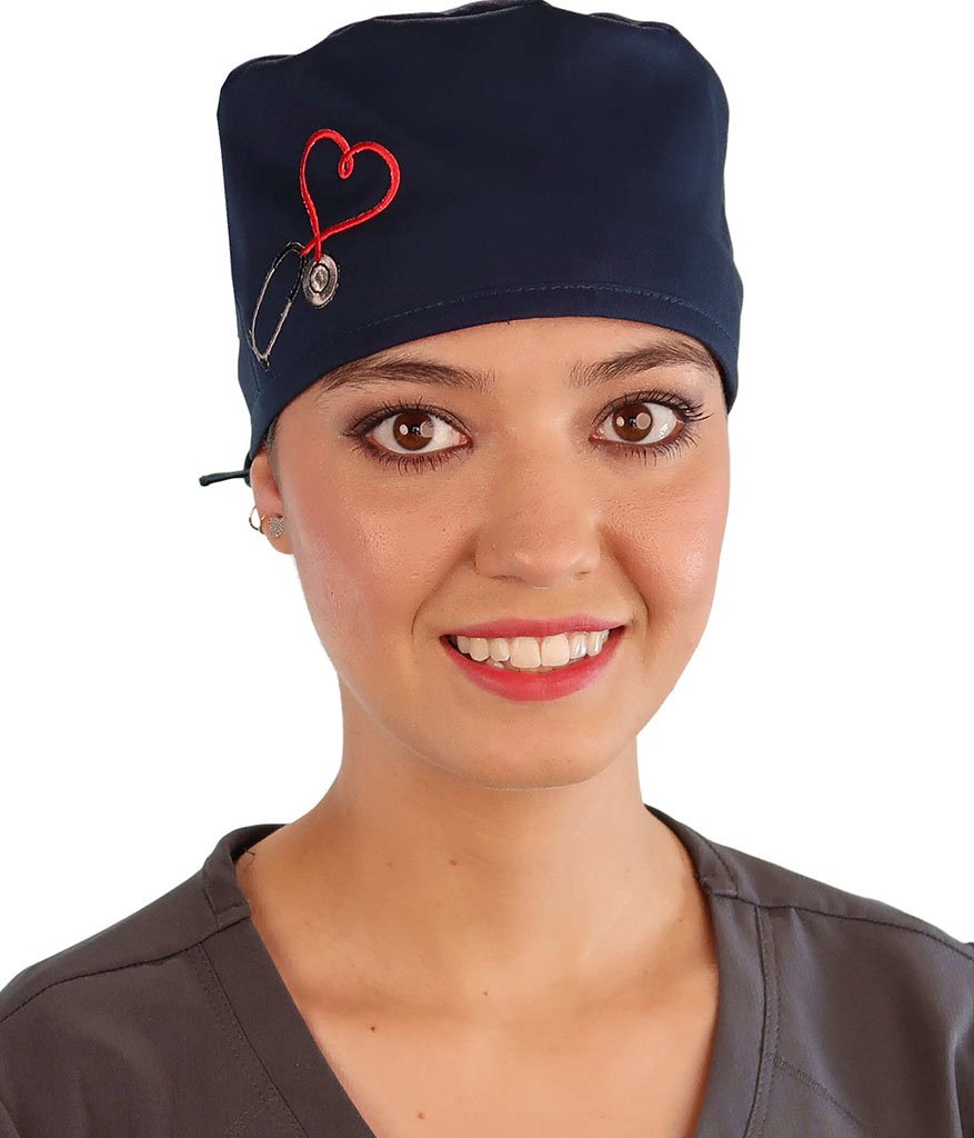 Front Facing View of a Woman Wearing a Classic Cotton Surgical Scrub Cap - Navy Fabric with Heart Stethoscope Patch.