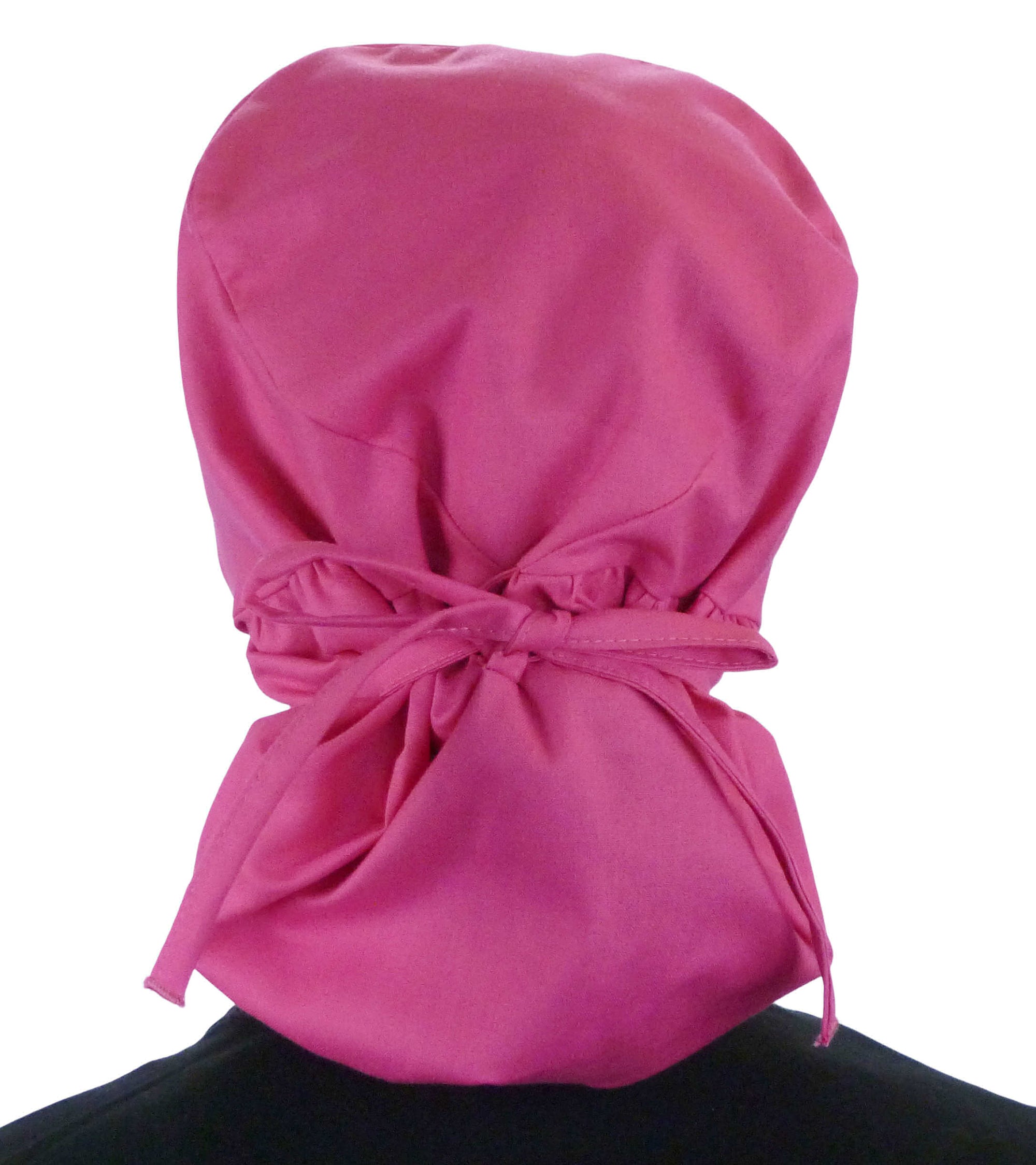 Back facing tied image of a woman in scrubs wearing a Hot Pink Big Hair Ponytail Scrub Cap and hot pink ties to hold the scrub cap in place.