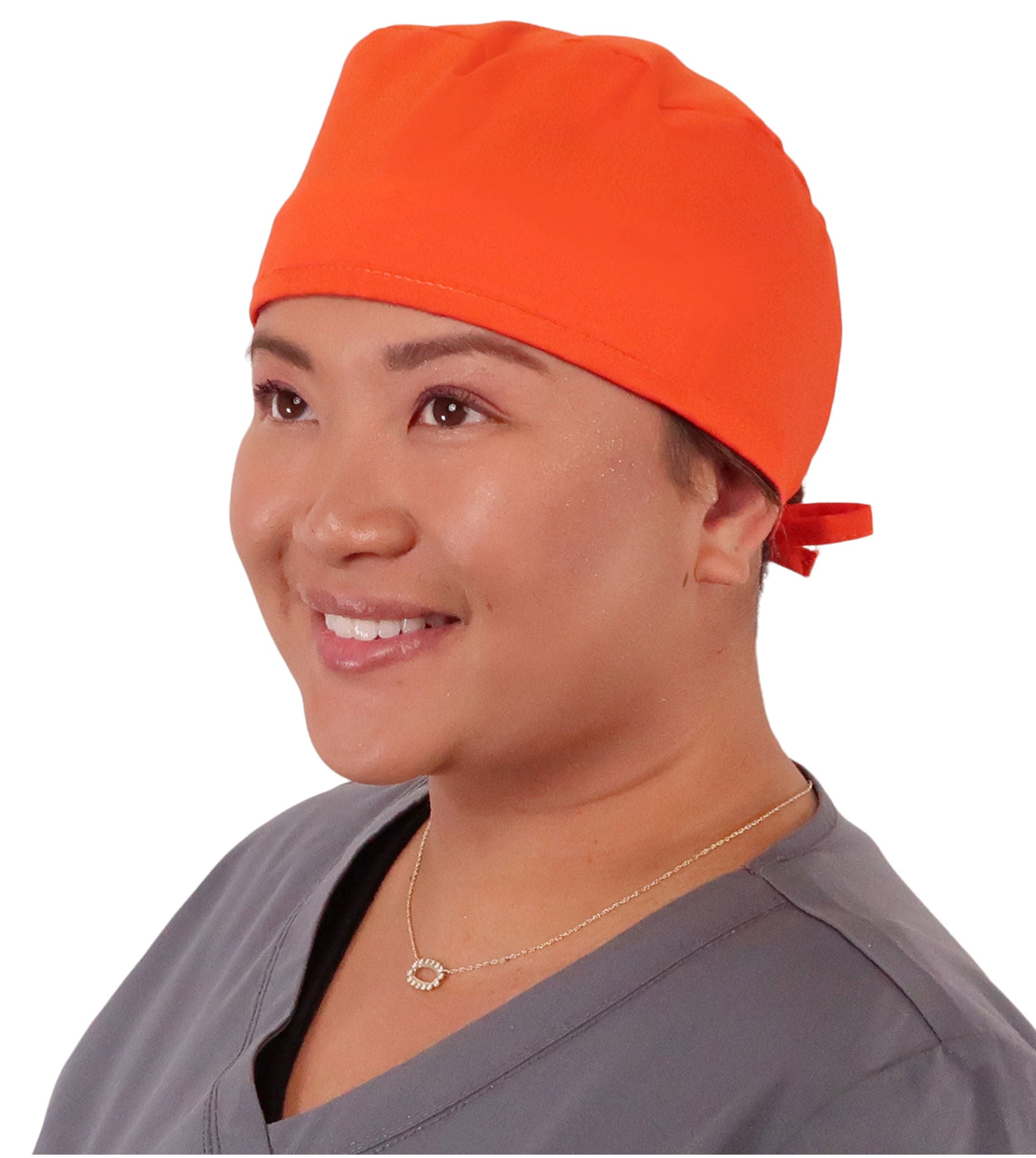 Front Facing View of a Woman Wearing a Classic Cotton Surgical Scrub Cap - Blaze Orange Fabric.