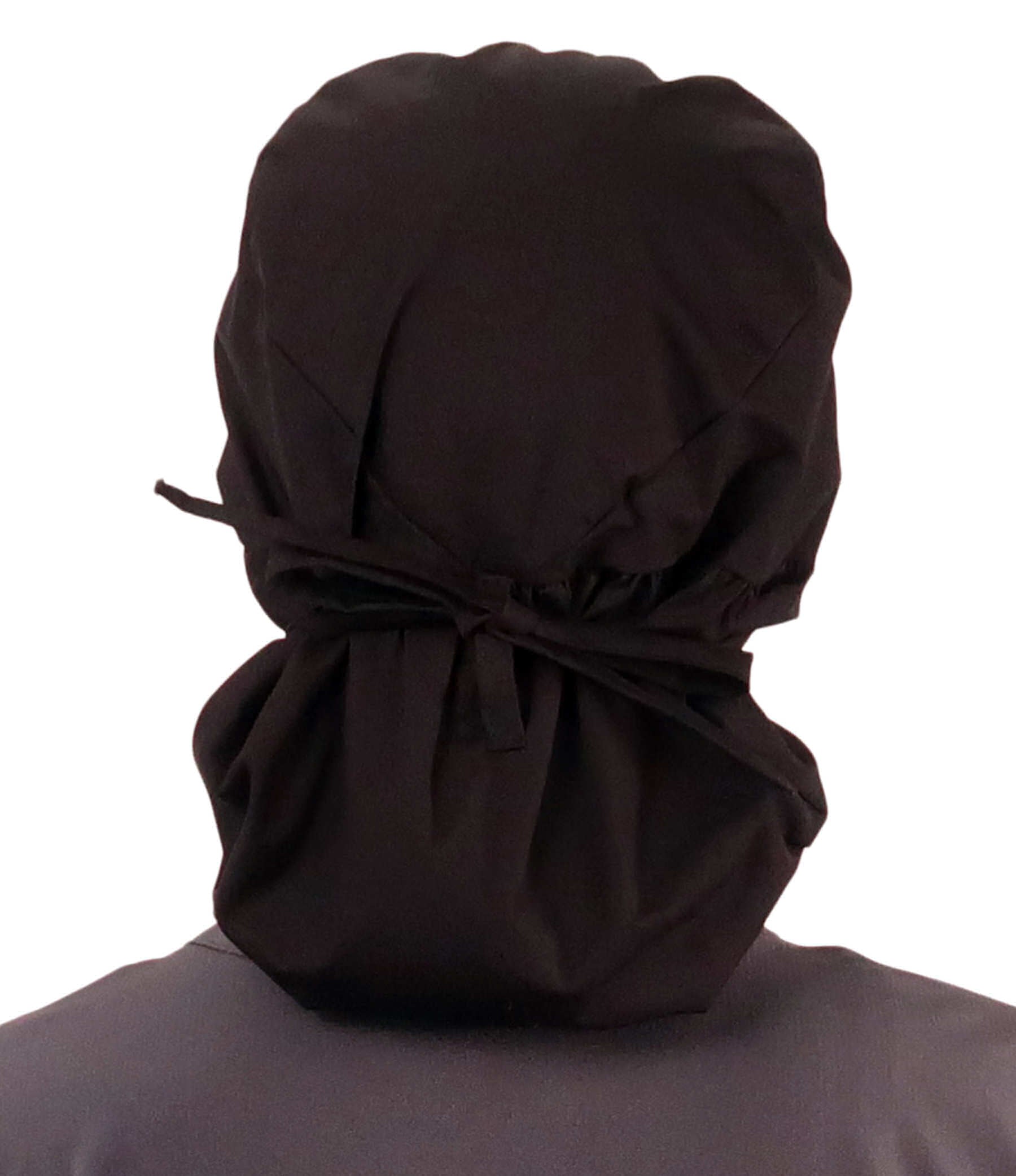 Back facing tied image of a woman in scrubs wearing a Big Hair Ponytail Scrub Cap with a Medium Pink Ribbon Patch on Black.