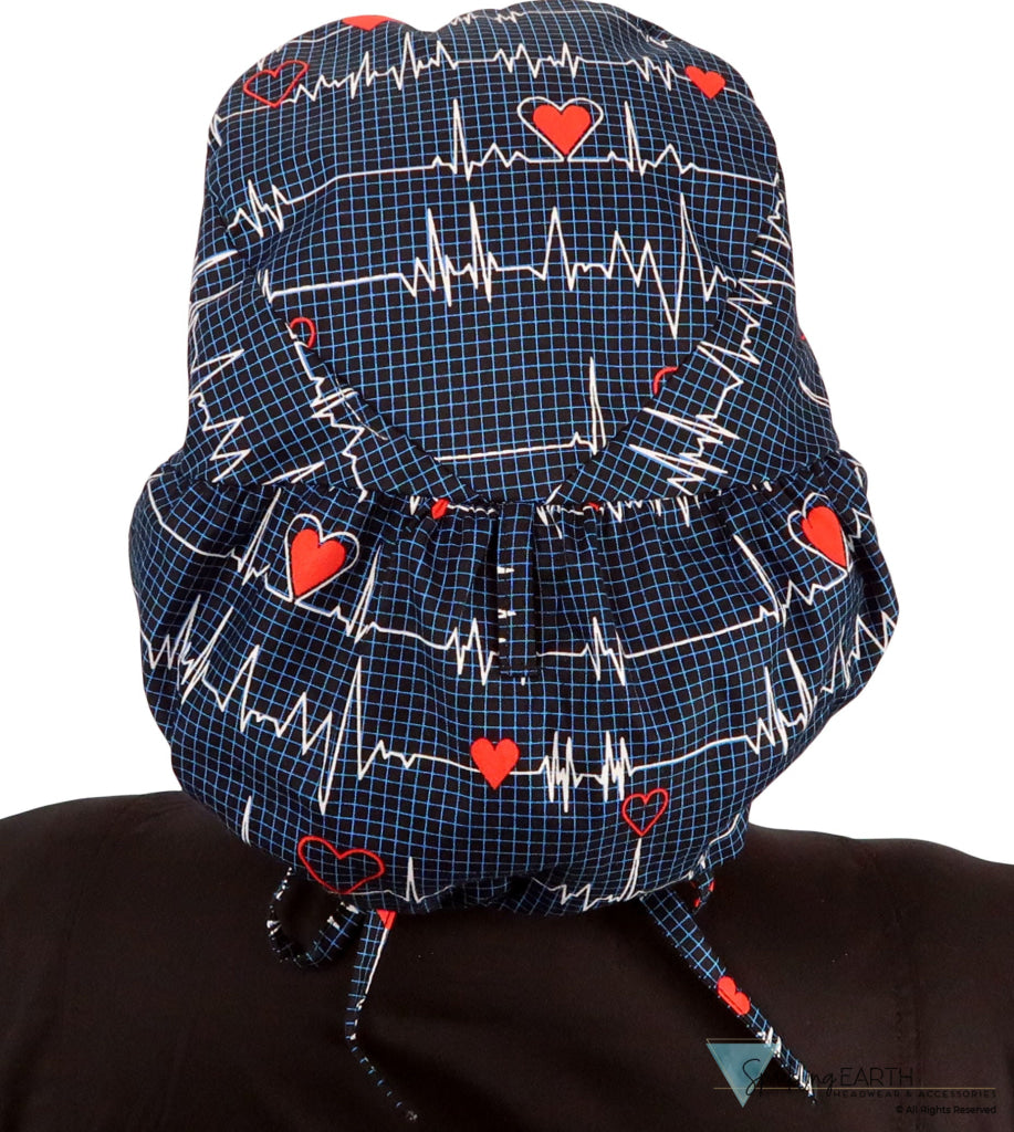 Back facing image untied of a woman in scrubs wearing a Big Hair Ponytail Scrub Cap with a Heartbeats on Navy pattern.