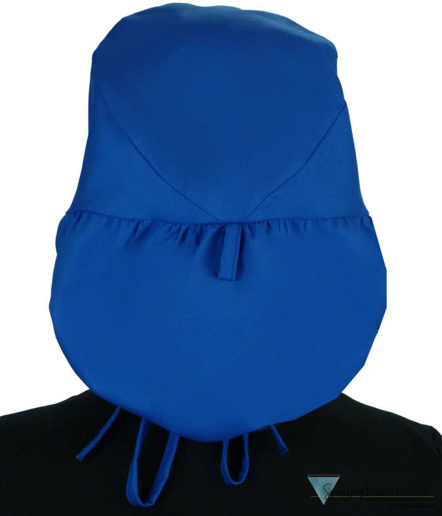 Back facing untied image of a woman in scrubs wearing a Royal Big Hair Ponytail Scrub Cap and royal ties to hold the scrub cap in place.