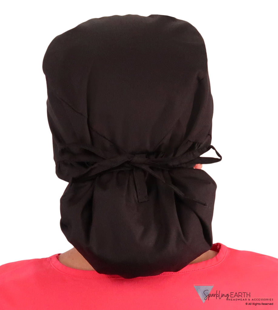 Back facing image of a woman in scrubs wearing a Black Big Hair Ponytail Scrub Cap and black ties to hold the scrub cap in place.