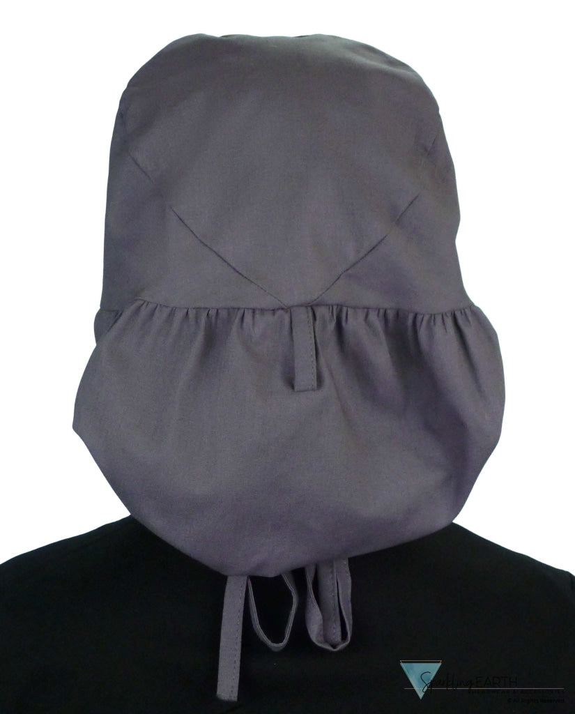 Back facing untied image of a woman in scrubs wearing a Grey Big Hair Ponytail Scrub Cap and grey ties to hold the scrub cap in place.