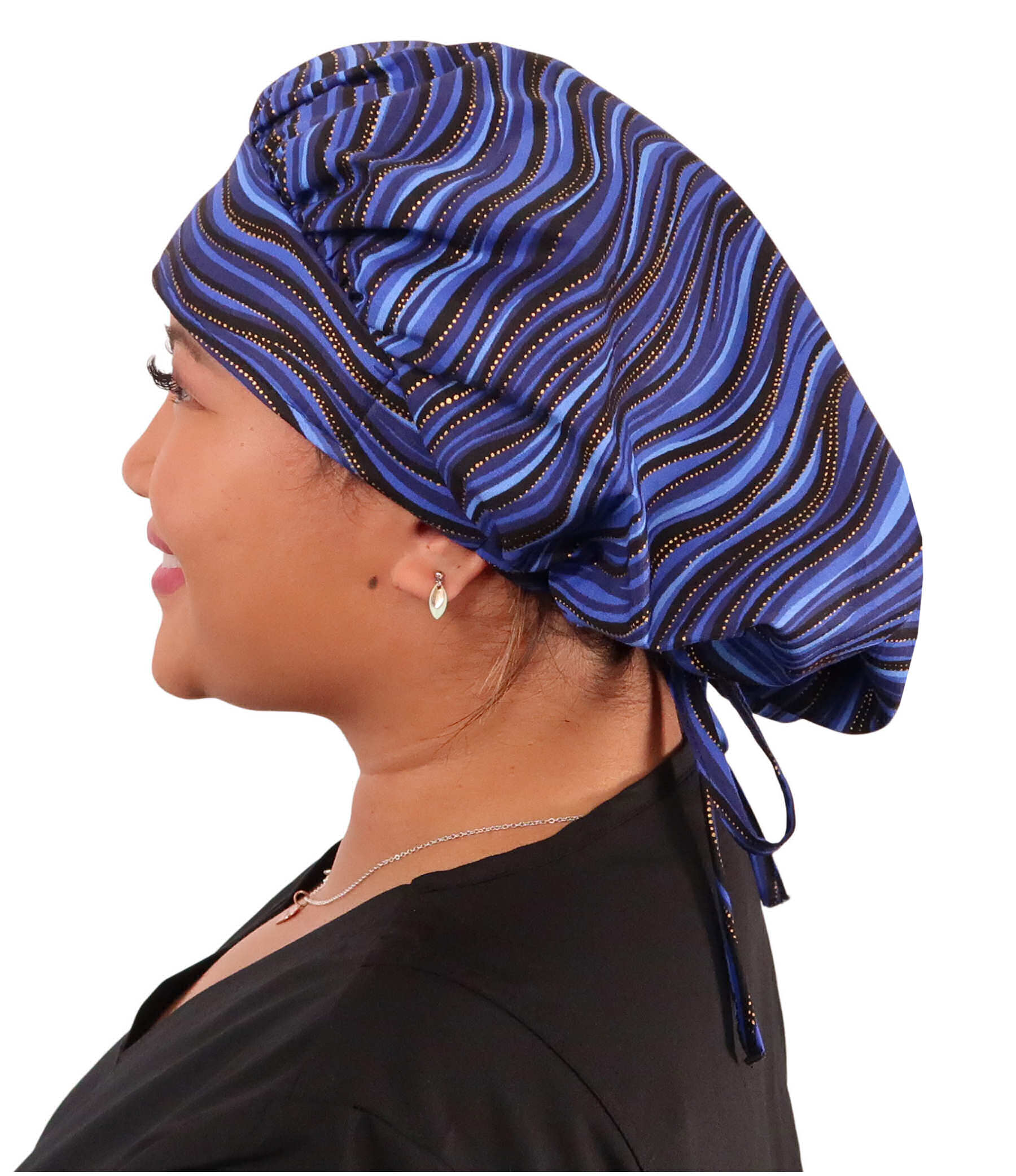 Side Facing Untied View of a Woman Wearing a Banded Bouffant Ponytail Surgical Scrub Cap - Waves of Blue Patterned Fabric 