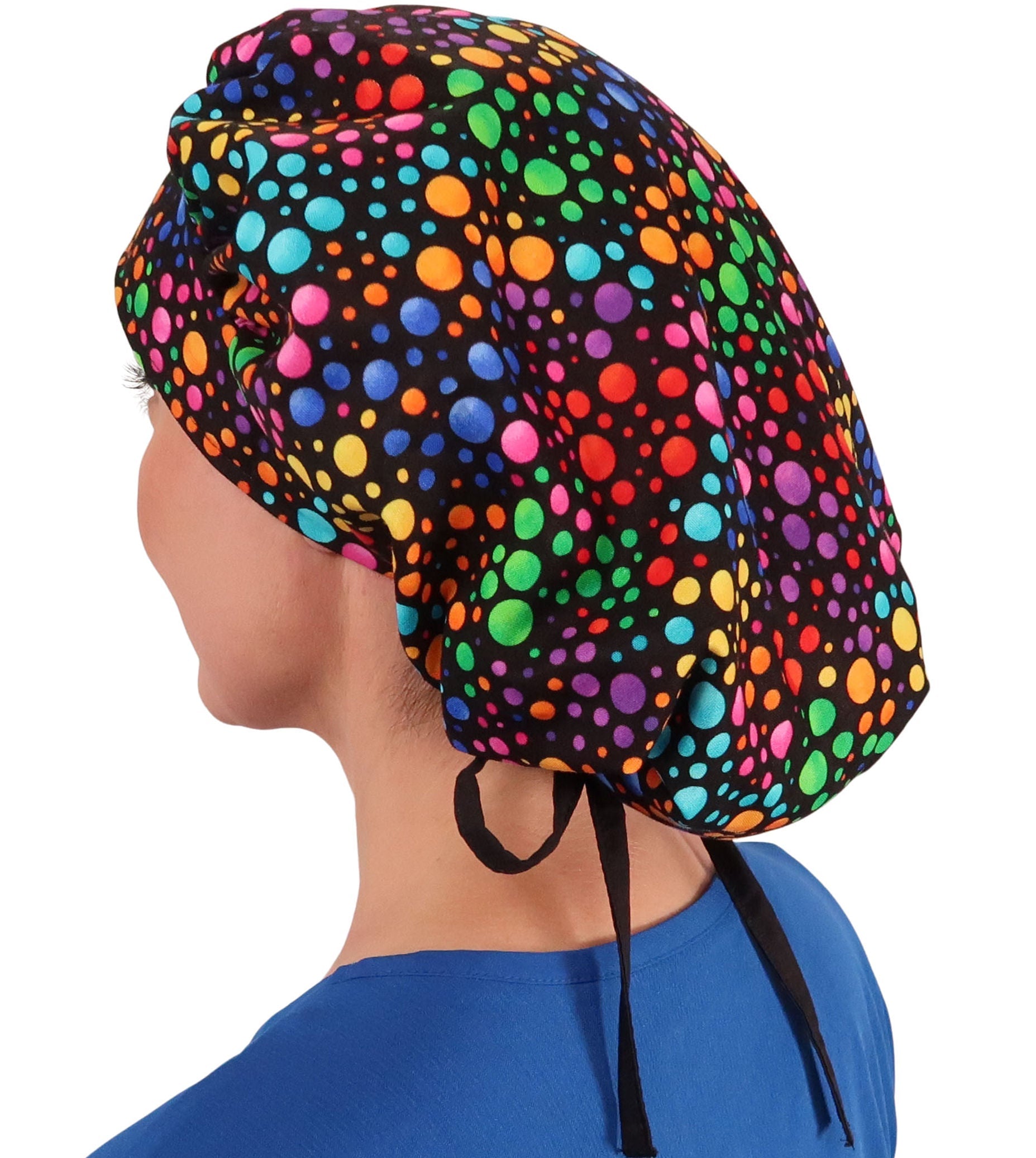 Side Facing Untied View of a Woman Wearing a Banded Bouffant Ponytail Surgical Scrub Cap - Multi Color Dots Patterned Fabric with Black Ties 