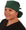 Front facing tied image of a woman in scrubs wearing a Big Hair Ponytail Scrub Cap with a Hunter Green pattern.