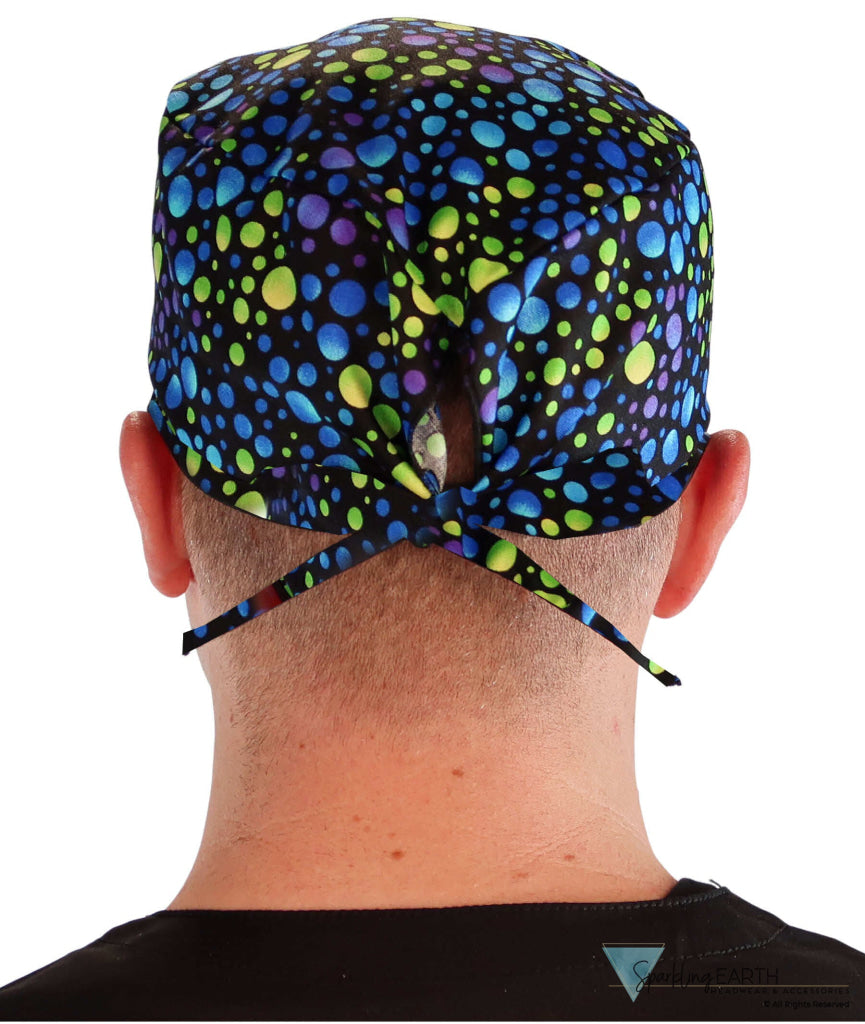 Back facing image of a man in scrubs wearing a Classic Surgical Scrub Cap in a Blue, Green and Purple Dots pattern.