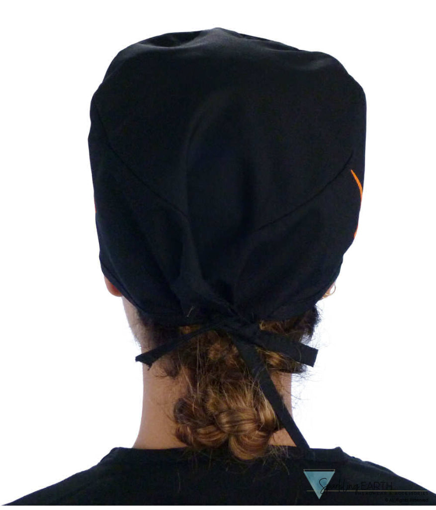 Back facing image of a woman in scrubs wearing a Classic Surgical Scrub Cap in a EKG Signal and Medical Sign pattern.