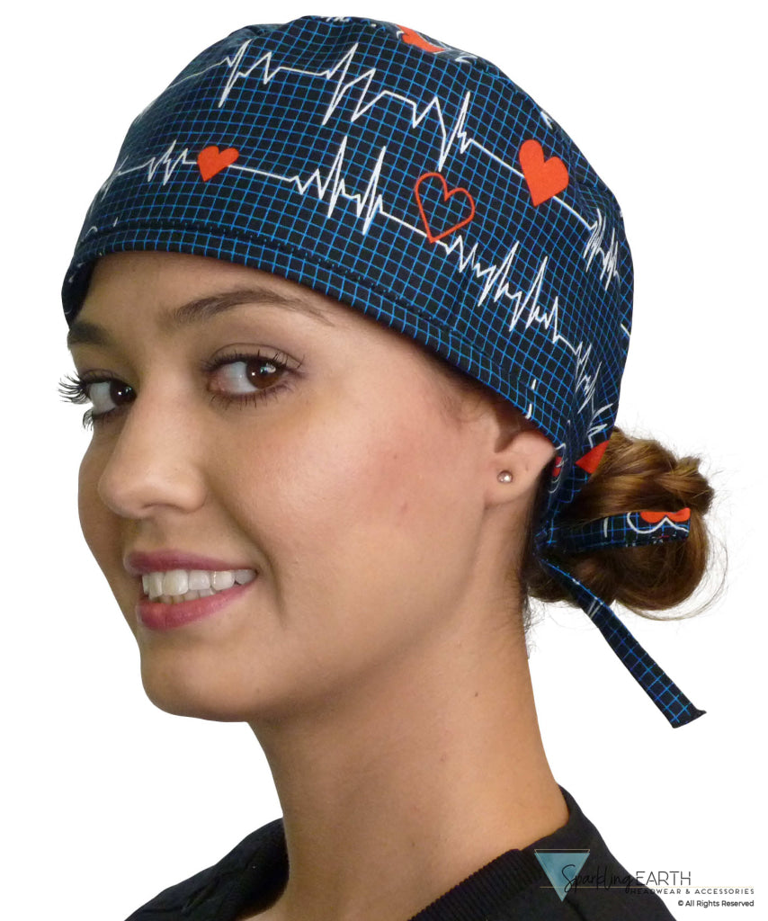 Front facing image of a woman in scrubs wearing a Classic Surgical Scrub Cap in a Heartbeats on Navy pattern.