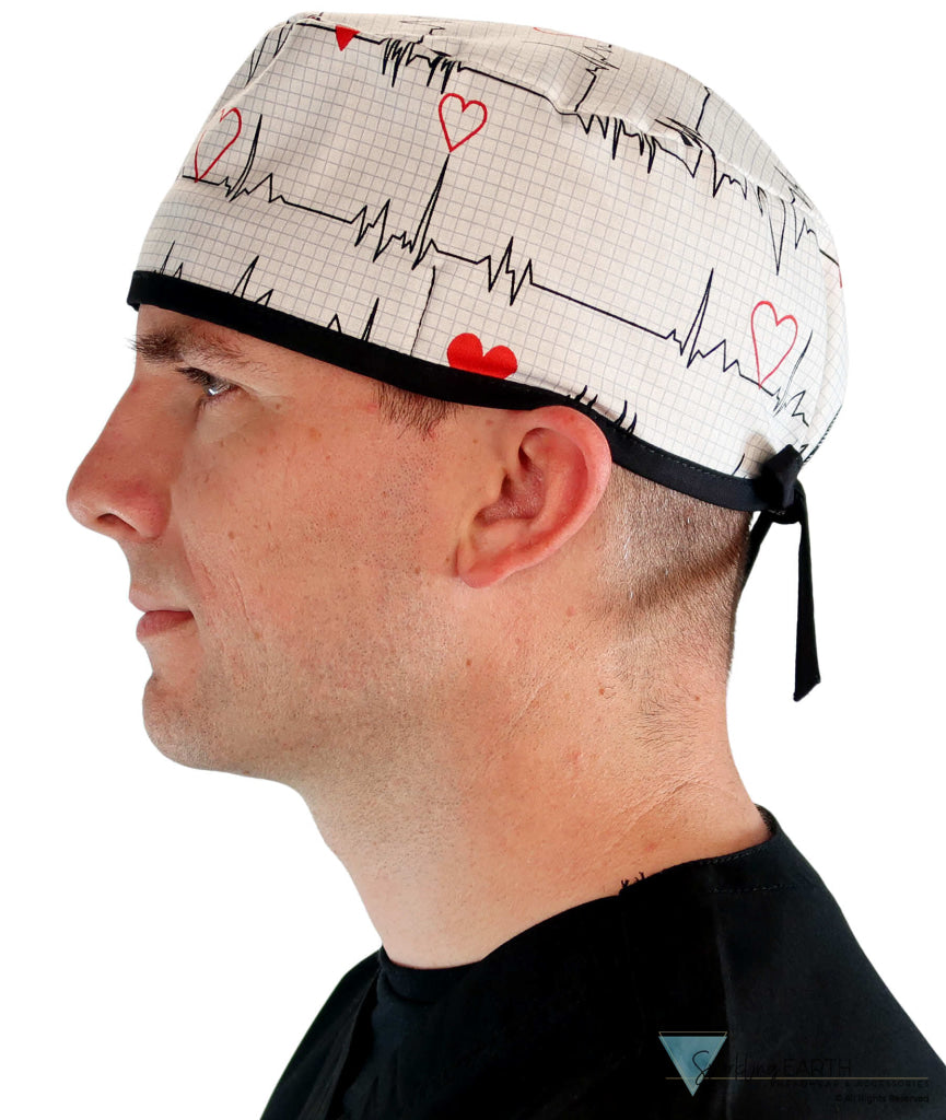 Side facing image of a man in scrubs wearing a Classic Surgical Scrub Cap in a Heartbeats on White pattern.