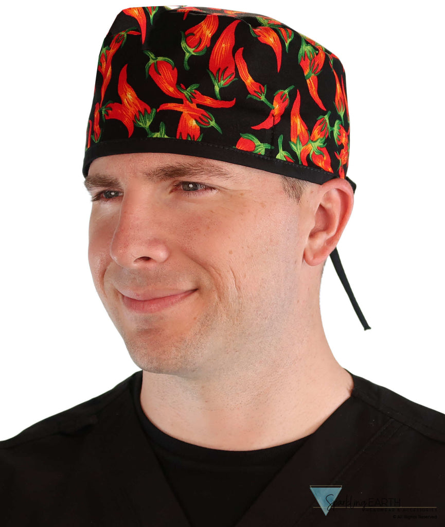 Front facing image of a man in scrubs wearing a Classic Surgical Scrub Cap in a Mixed Chili Peppers pattern.